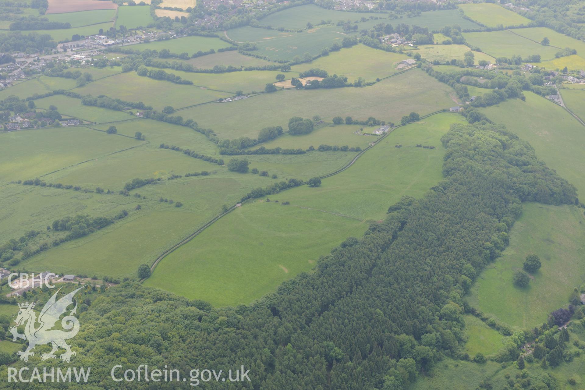 Earthwork enclosures at Coed-y-Caerau, Pen Toppen Ash Roman fort near Newport. Oblique aerial photograph taken during the Royal Commission's programme of archaeological aerial reconnaissance by Toby Driver on 11th June 2015.