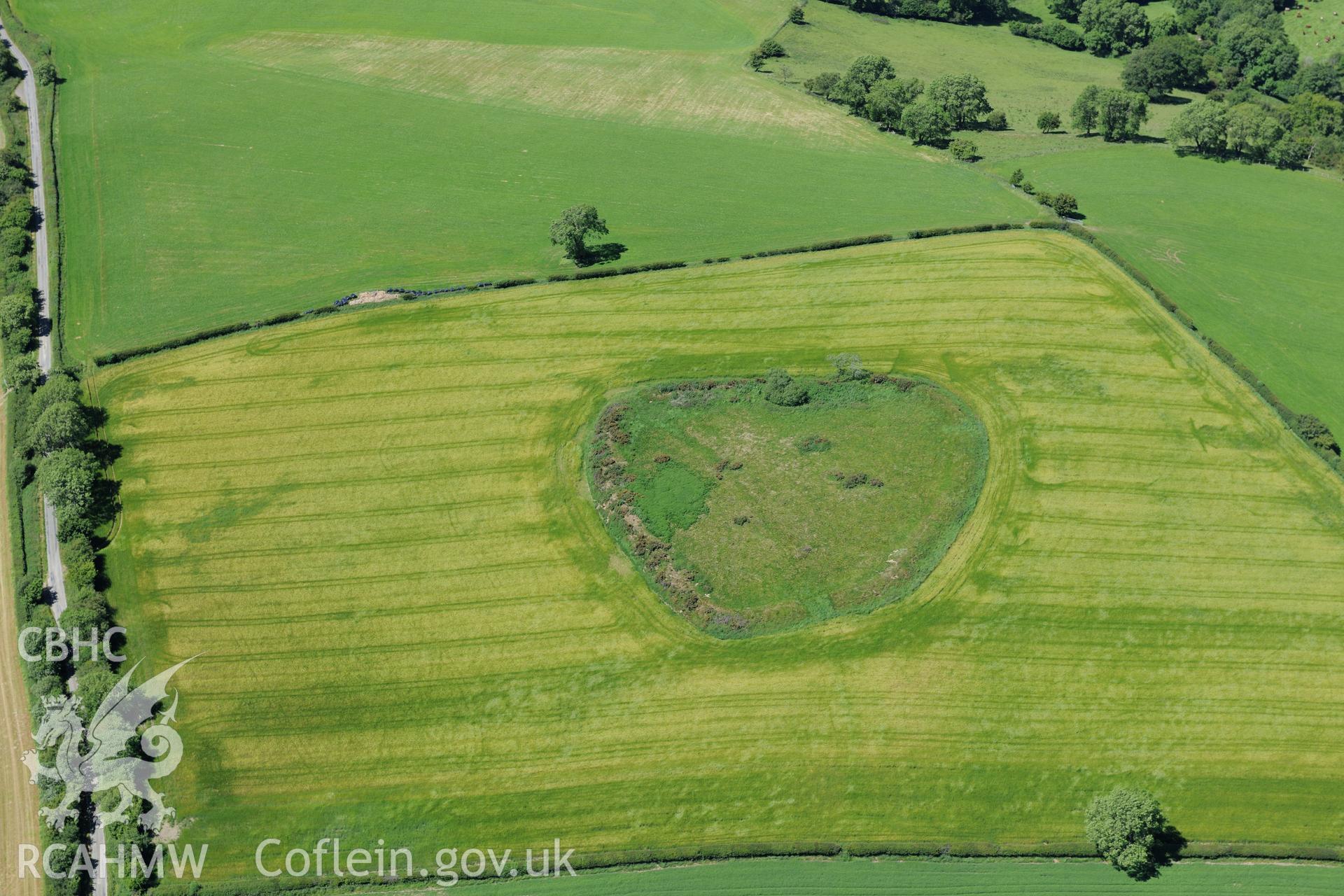 Caer Din defended enclosure, west of Bishop's Castle. Oblique aerial photograph taken during the Royal Commission's programme of archaeological aerial reconnaissance by Toby Driver on 30th June 2015.