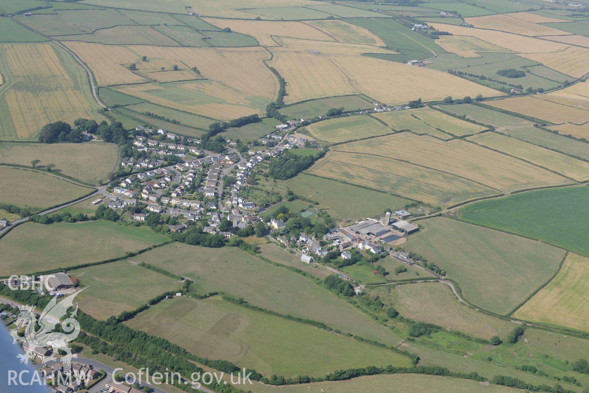 The village of Llanmaes, with Great House Farm, on the north eastern outskirts of Llantwit Major. Oblique aerial photograph taken during the Royal Commission?s programme of archaeological aerial reconnaissance by Toby Driver on 1st August 2013.