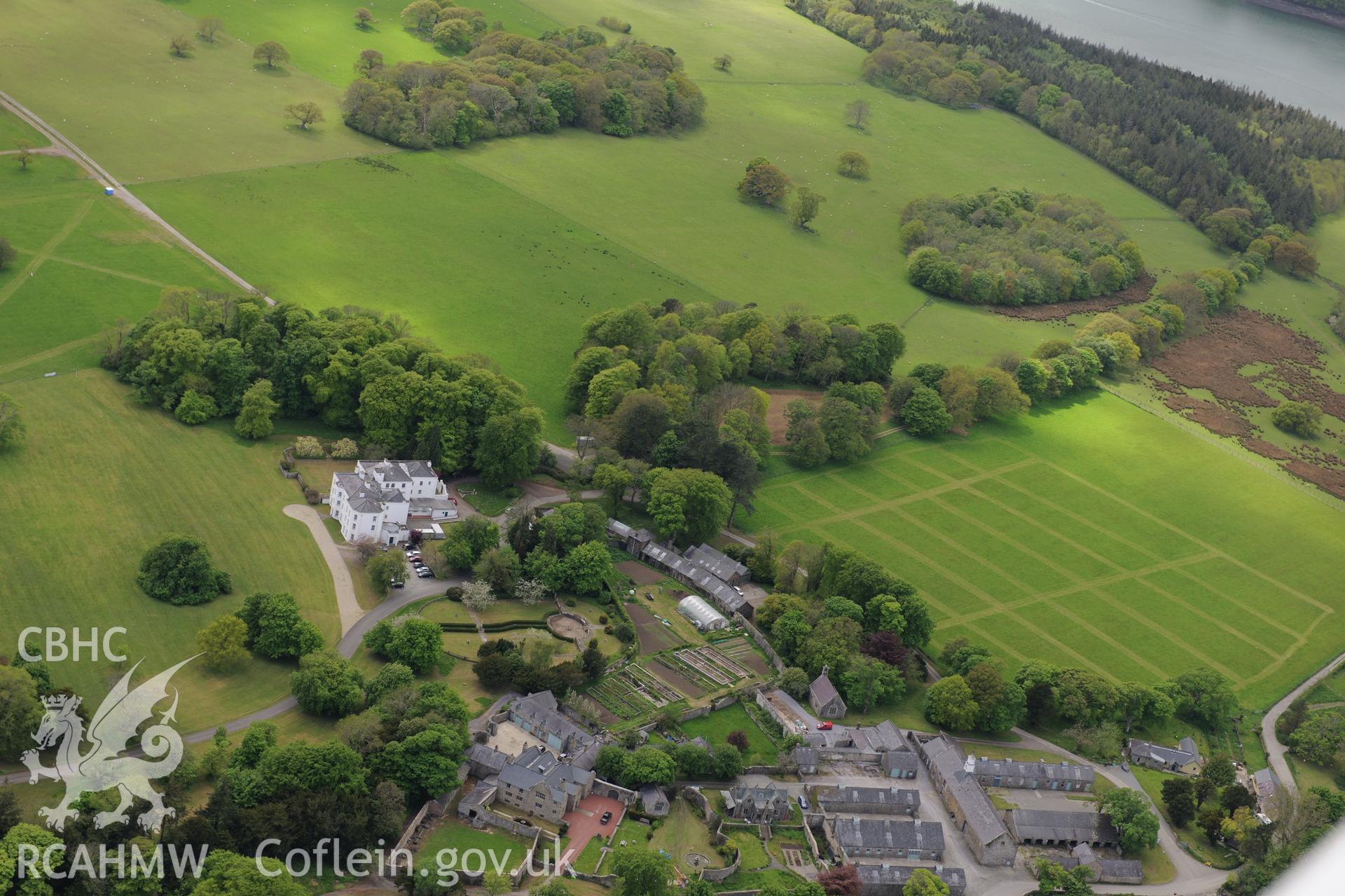 Vaynol Old Hall, Vaynor New Hall and associated farm, farmyard range, and garden, Capel y Graig, Bangor. Oblique aerial photograph taken during the Royal Commission?s programme of archaeological aerial reconnaissance by Toby Driver on 22nd May 2013.