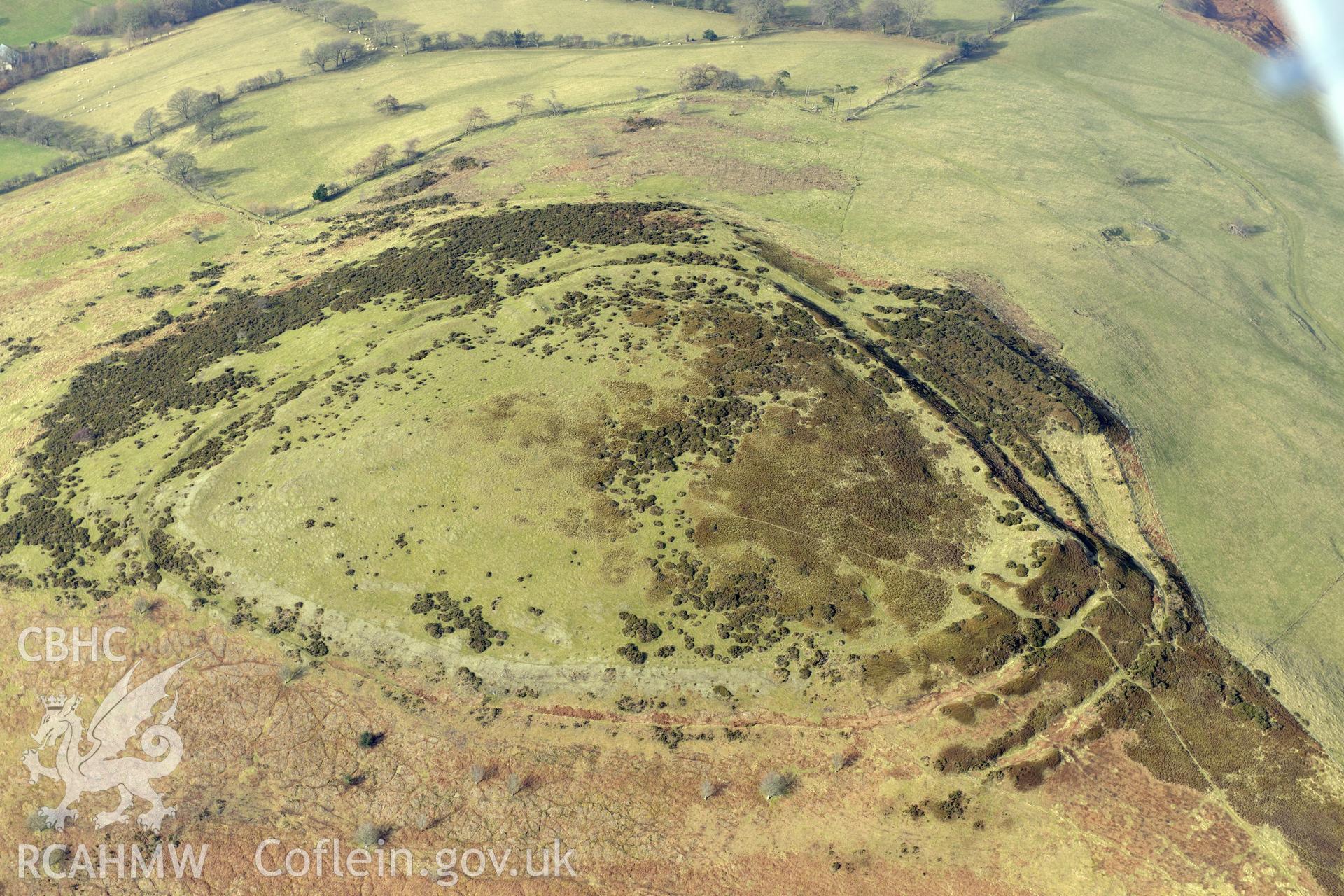 Moel-y-Gaer hillfort, Llanbedr, between Ruthin and Mold. Oblique aerial photograph taken during the Royal Commission?s programme of archaeological aerial reconnaissance by Toby Driver on 28th February 2013.