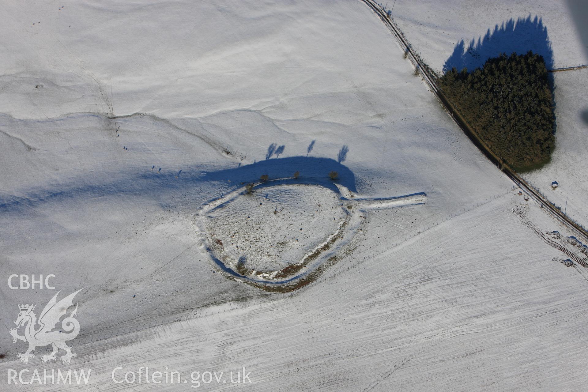 Twyn-y-Gaer defended enclosure. Oblique aerial photograph taken during the Royal Commission?s programme of archaeological aerial reconnaissance by Toby Driver on 15th January 2013.