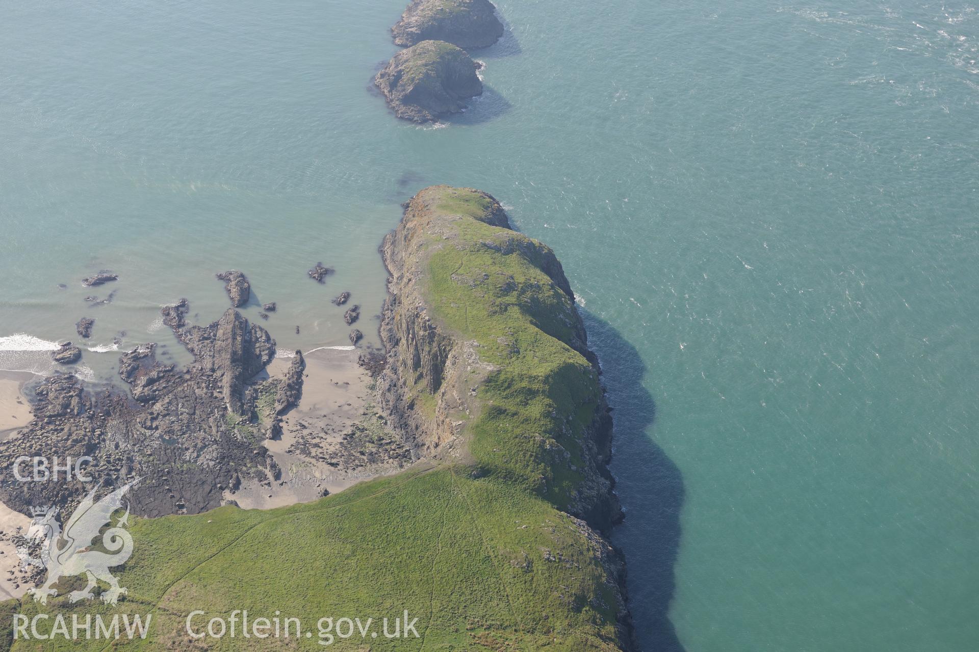 Porth-Egr promontory fort and the landing place at Culporth, north east of St. Davids, on the Pembrokeshire coast. Oblique aerial photograph taken during the Royal Commission's programme of archaeological aerial reconnaissance by Toby Driver on 30th September 2015.