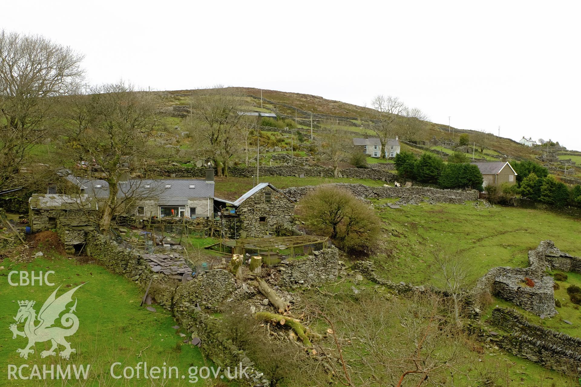 Colour photograph showing view looking north east at field walls and cottages (including Bryn Tirion kennels on the left), Cilgwyn, produced by Richard Hayman 7th March 2017