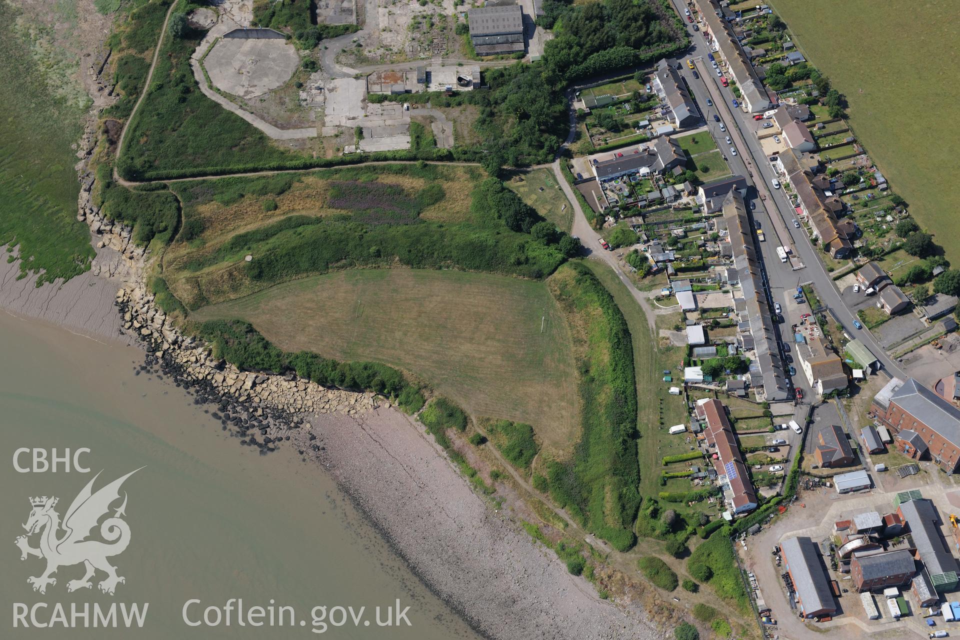 Sudbrook village, east of Caldicot, with Sudbrook fort, pumping station & the remains of Sudbrook medieval village. Oblique aerial photograph taken during Royal Commission?s programme of archaeological aerial reconnaissance by Toby Driver, 1st August 2013.