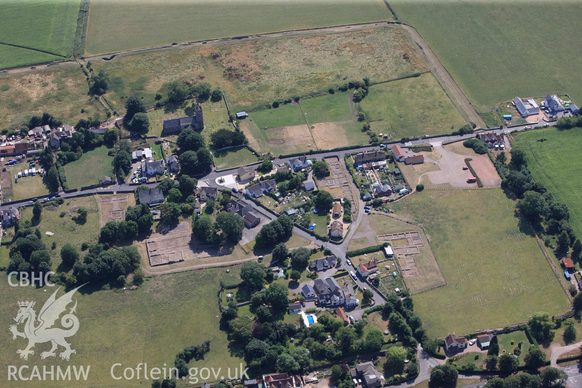 St. Stephen's church, Roman Amphitheatre, Roman Temple and Venta Silurum (Caerwent Roman City), Caerwent, near Chepstow. Oblique aerial photograph taken during the RCAHMW?s programme of archaeological aerial reconnaissance by Toby Driver, 1st August 2013.