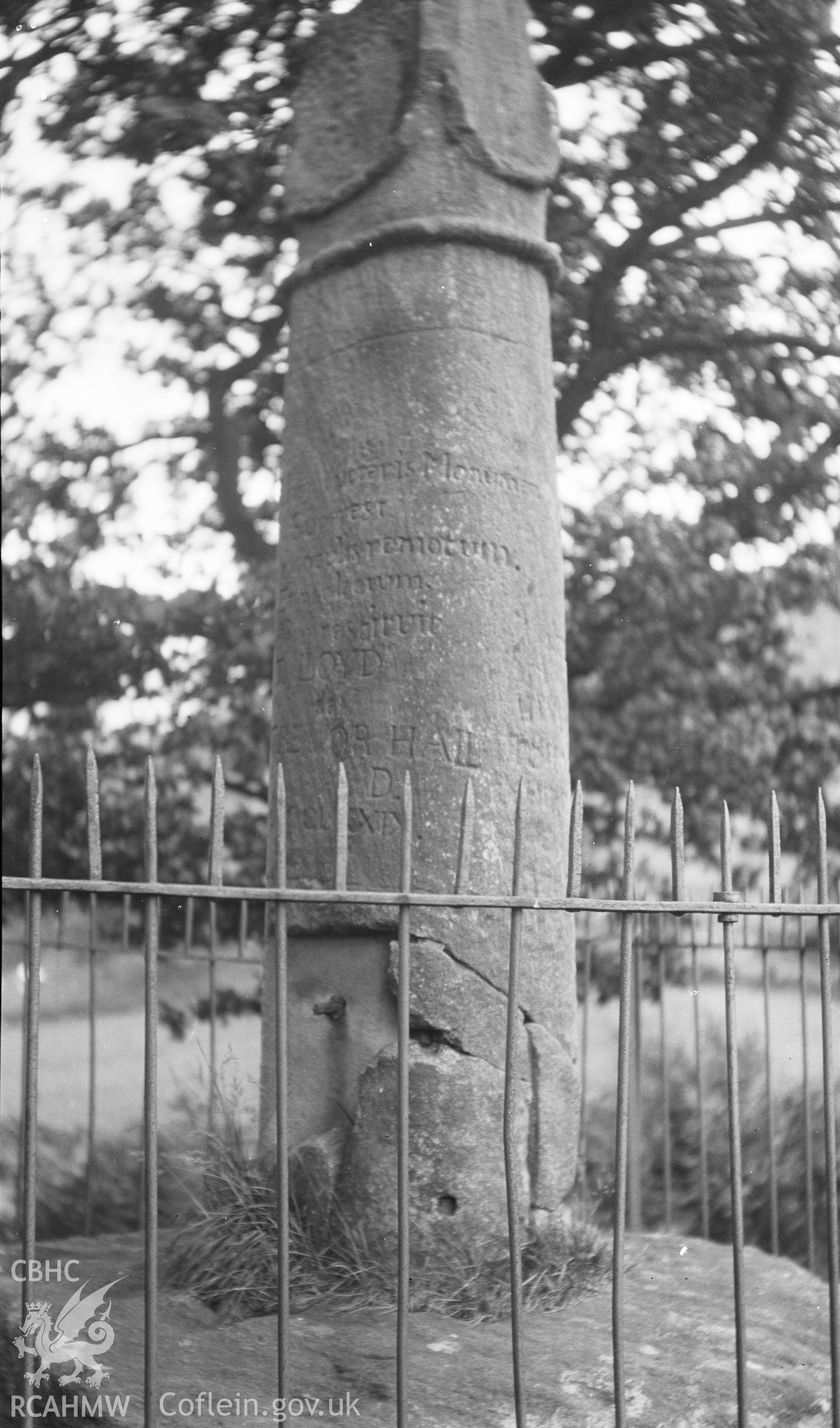 Digitised copy of a nitrate negative showing detail view of Eliseg's Pillar, taken by Leonard Monroe, undated.