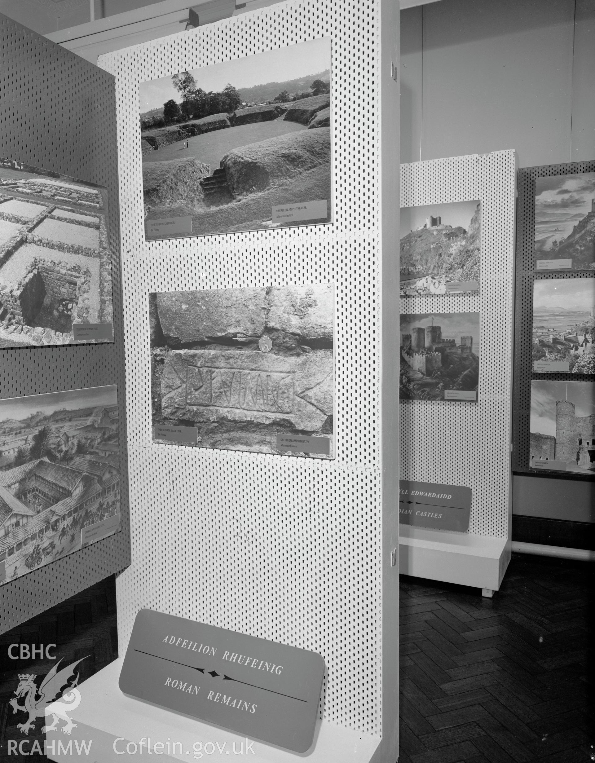 Digital copy of a black and white negative showing Ancient Monuments Exhibition, Welsh Tourer, Vivian Art Gallery, Swansea. From Cadw Monuments in Care Collection.