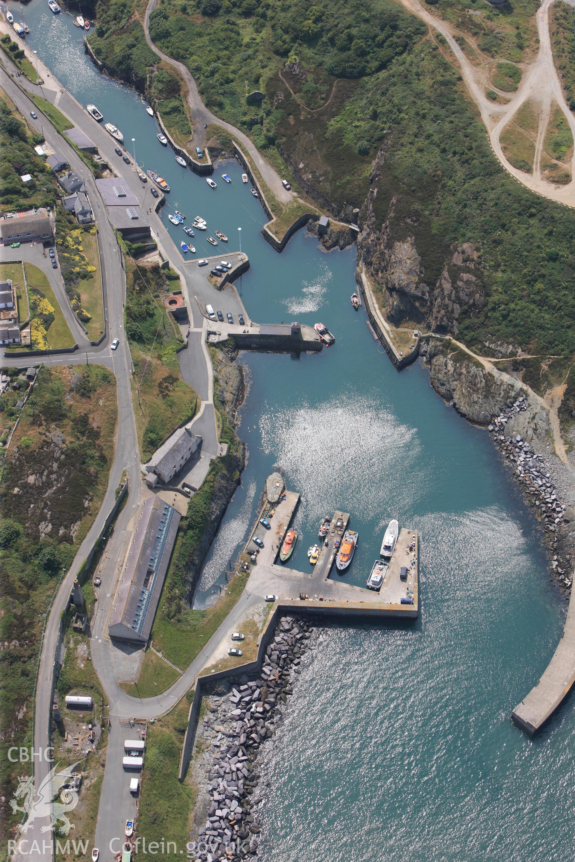 Amlwch harbour, Anglesey. Oblique aerial photograph taken during the Royal Commission?s programme of archaeological aerial reconnaissance by Toby Driver on 12th July 2013.