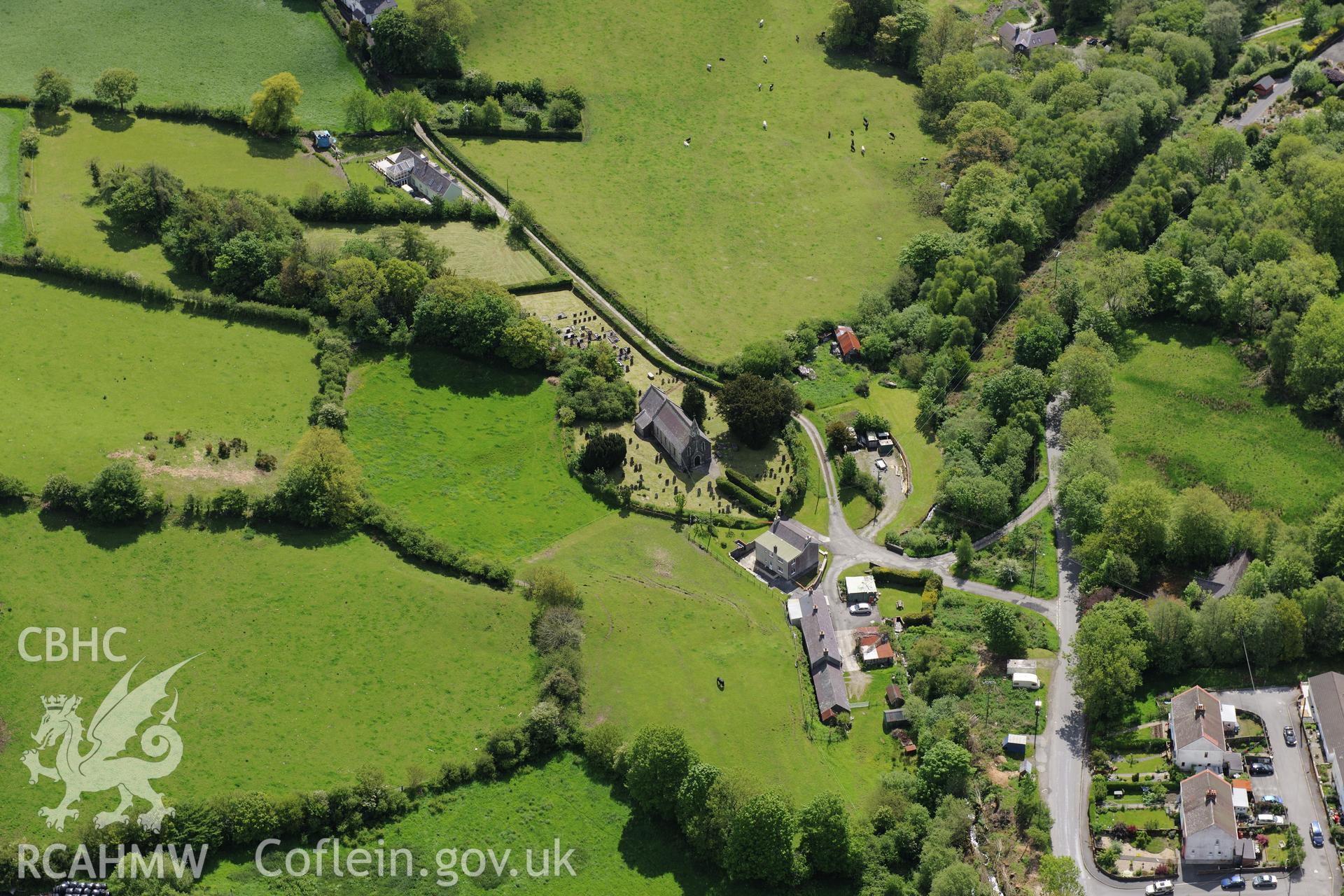 St. Sulien's Church and the village of Silian. Oblique aerial photograph taken during the Royal Commission's programme of archaeological aerial reconnaissance by Toby Driver on 3rd June 2015.