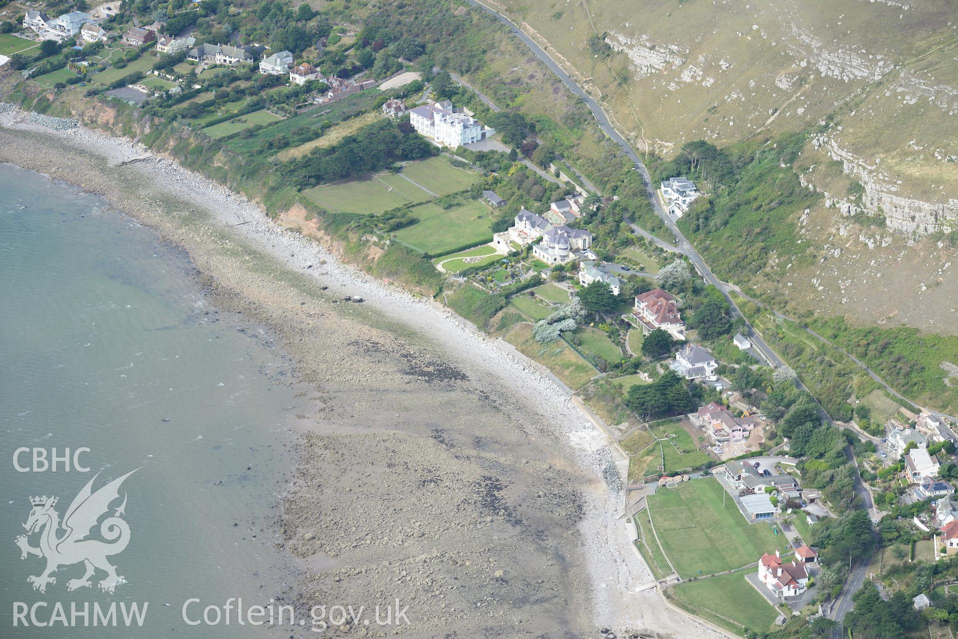 Gogarth Abbey, the remains of Gogarth Abbey, Gogarth Abbey garden and Llys Helyg Drive, Llandudno. Oblique aerial photograph taken during the Royal Commission's programme of archaeological aerial reconnaissance by Toby Driver on 11th September 2015.