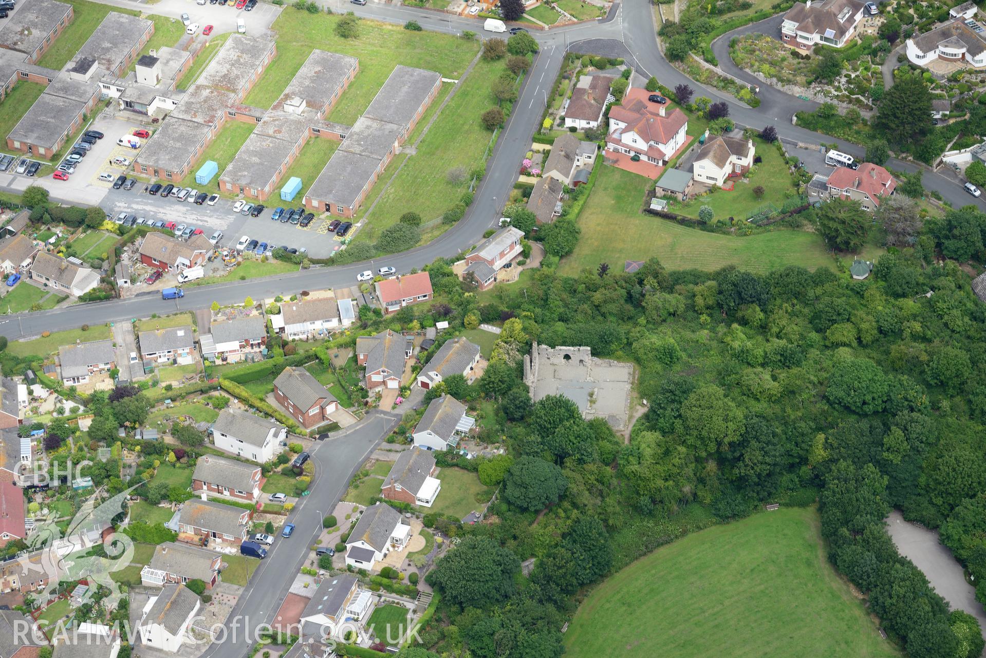 Rhos-on-Sea and the remains of Llys Euryn. Oblique aerial photograph taken during the Royal Commission's programme of archaeological aerial reconnaissance by Toby Driver on 30th July 2015.