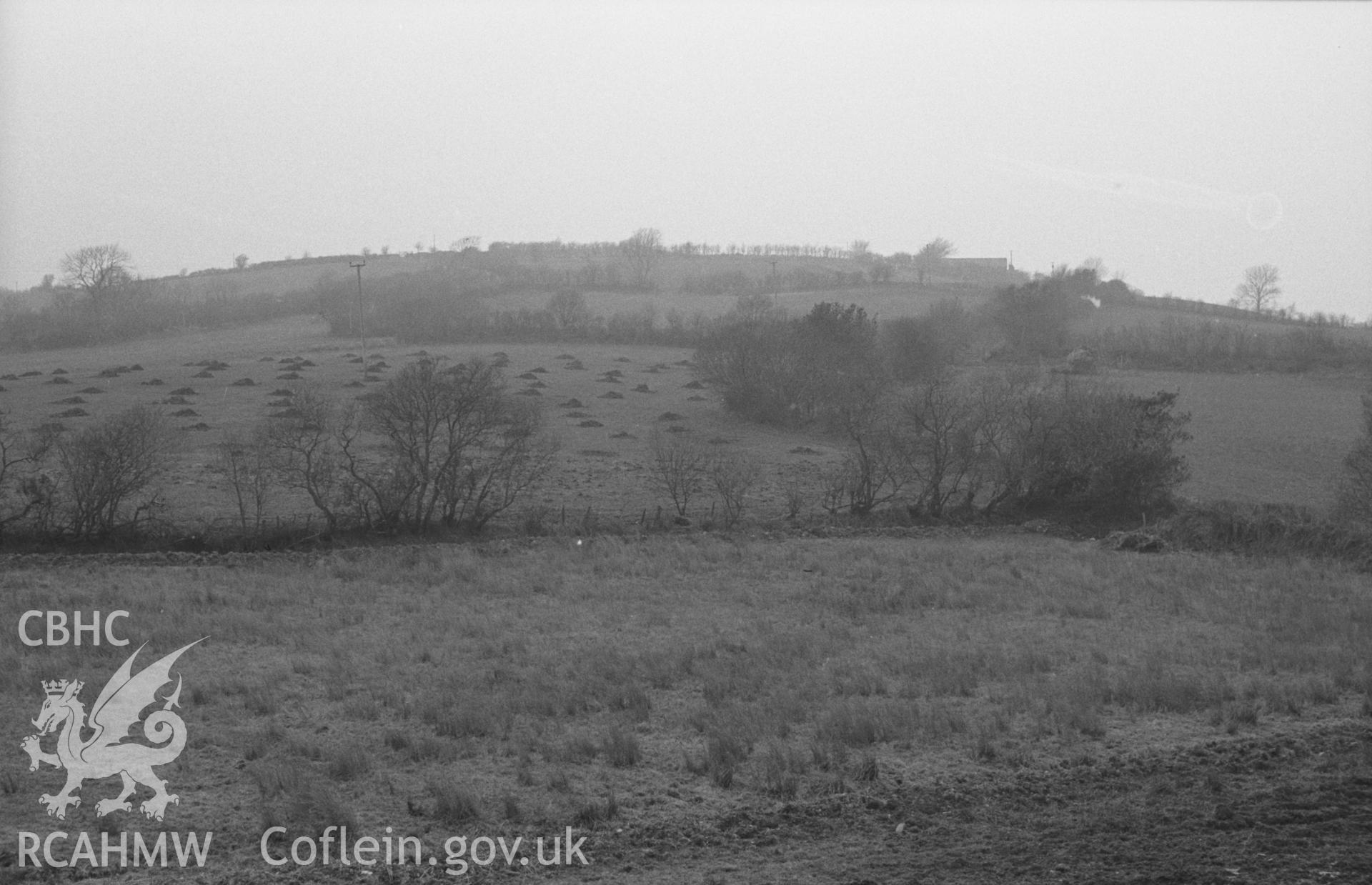 Digital copy of black & white negative showing view from immediately north of Fulbrook Farm to the side of the castel (on summit of hill); Llwyn-Gwinau farm on horizon to right. Photograph by Arthur O. Chater, April 1963 from SN 6696 6287, looking north.