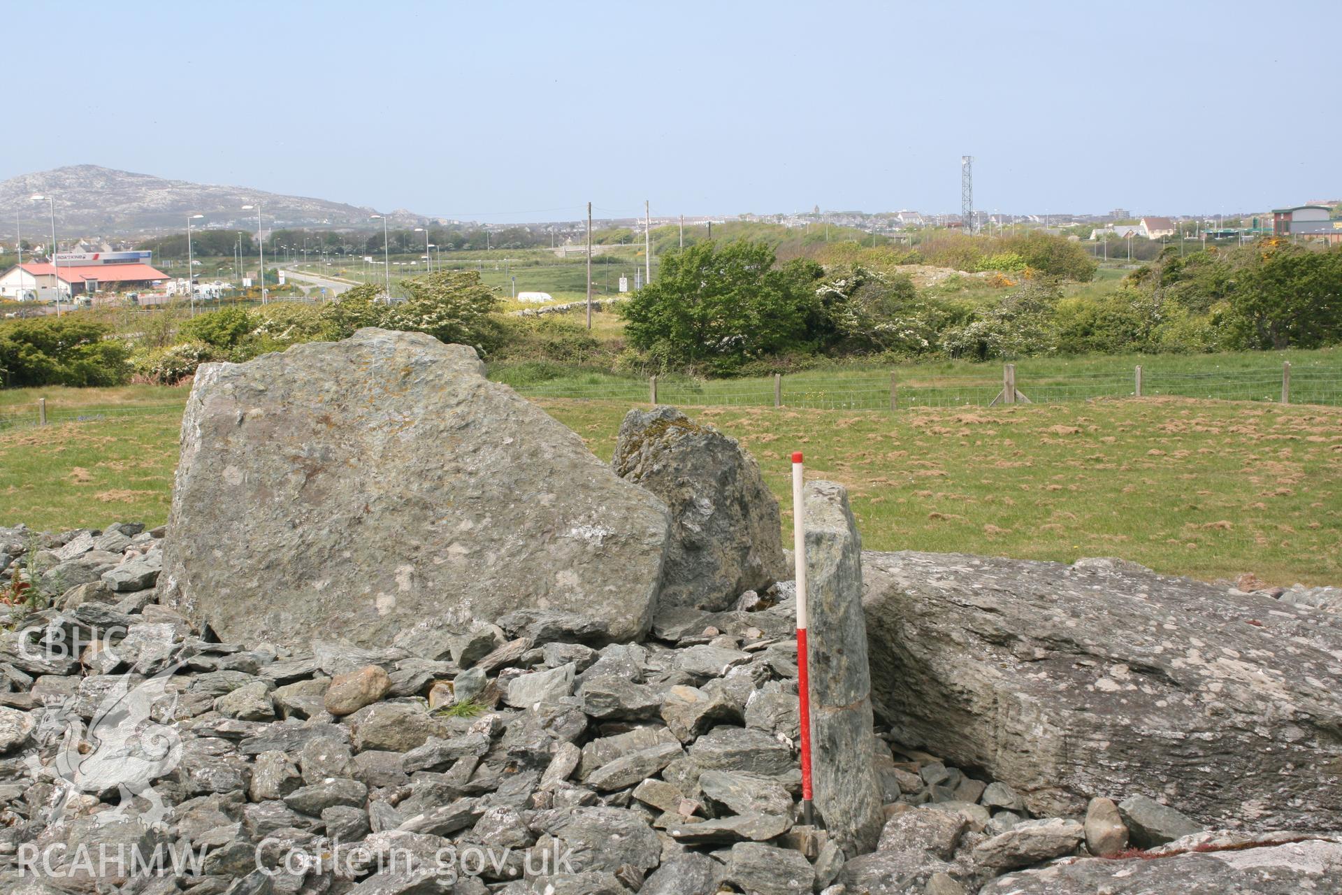 View northwest across the first and second tombs of Trefignath Burial Chamber. Digital photograph taken as part of archaeological work at Parc Cybi Enterprise Zone, Holyhead, Anglesey, carried out by Archaeology Wales, 2017. Project number: P2522.