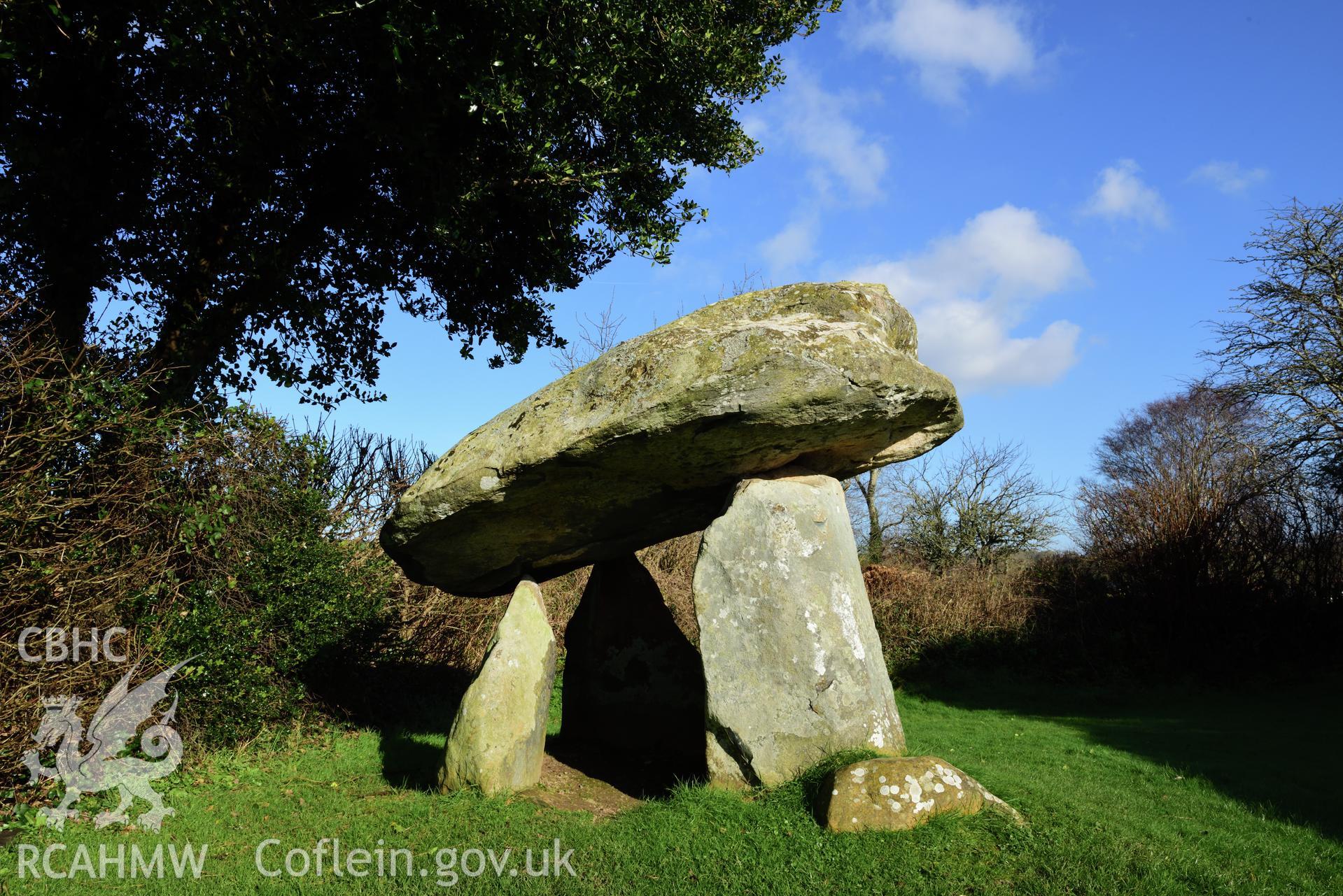 Royal Commission photo survey of Carreg Coetan chambered tomb in winter light, by Toby Driver