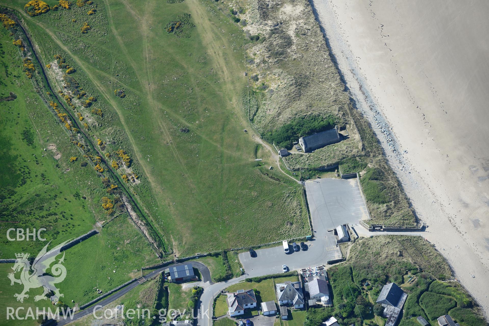 Aerial photography of St Tanwg's Church taken on 3rd May 2017.  Baseline aerial reconnaissance survey for the CHERISH Project. ? Crown: CHERISH PROJECT 2017. Produced with EU funds through the Ireland Wales Co-operation Programme 2014-2020. All material