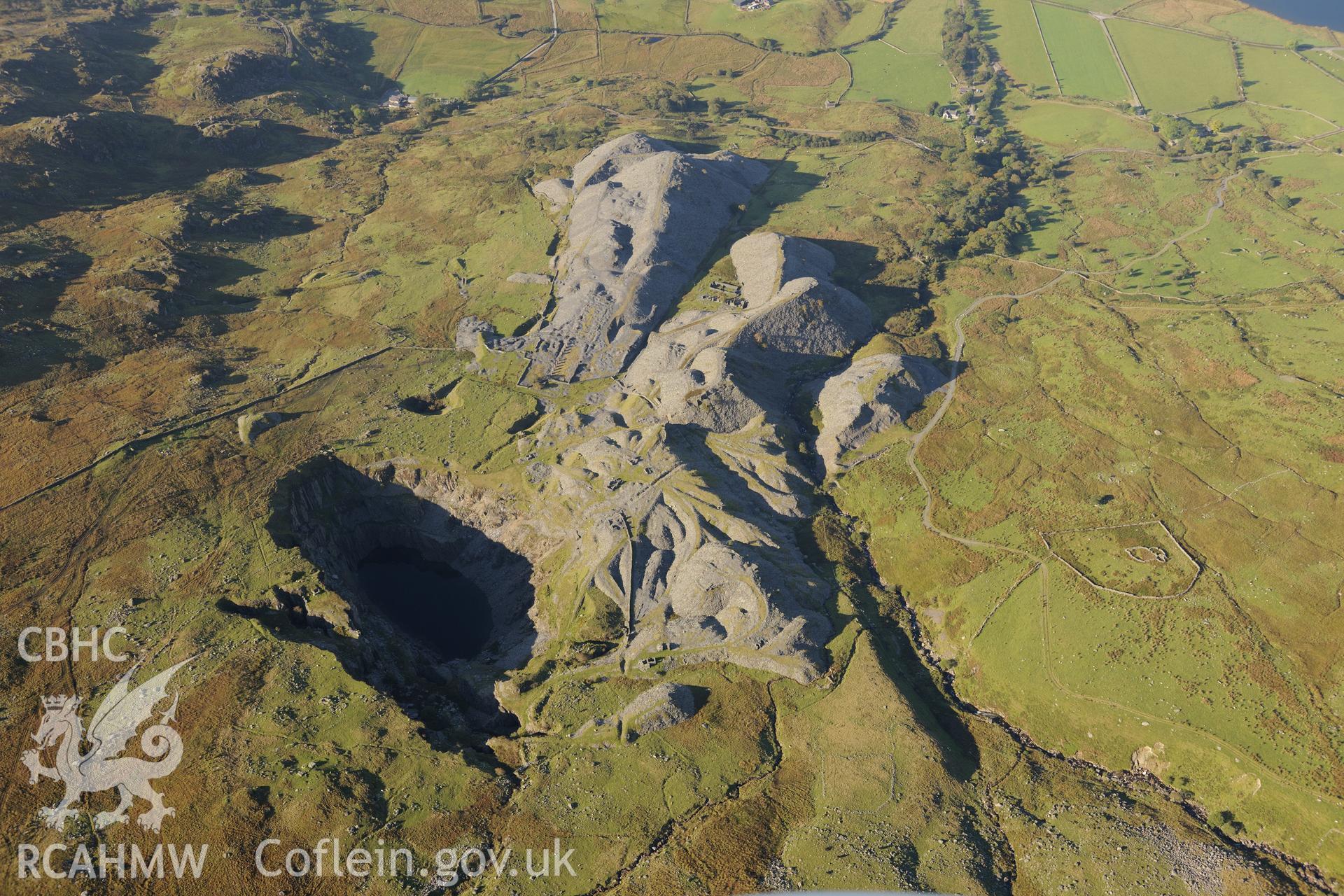 Barracks at Glanrafon slate quarry, near Capel Garmon. Oblique aerial photograph taken during the Royal Commission's programme of archaeological aerial reconnaissance by Toby Driver on 2nd October 2015.