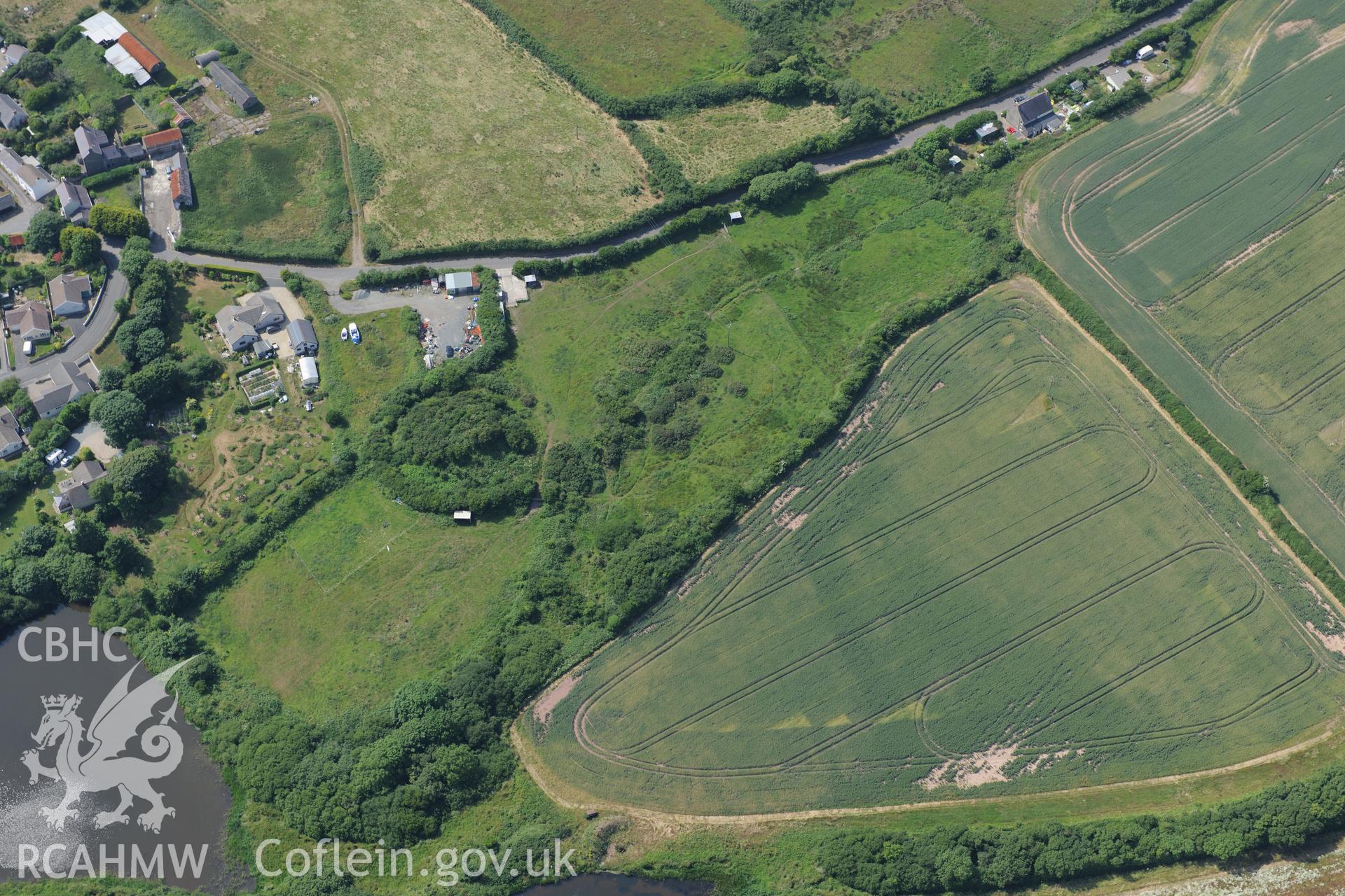 St Ishmael's Tump. Oblique aerial photograph taken during the Royal Commission?s programme of archaeological aerial reconnaissance by Toby Driver on 16th July 2013.