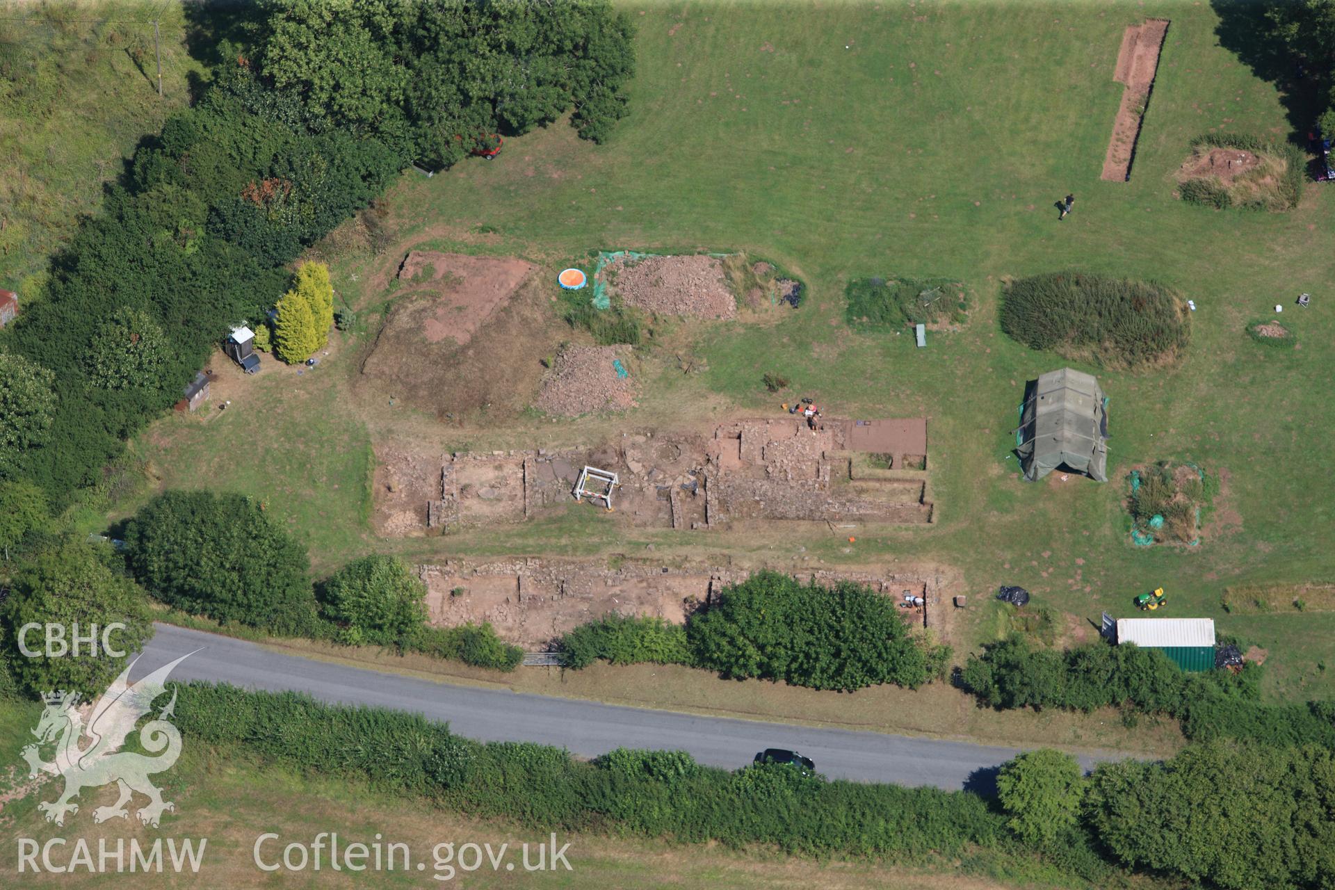 Excavations immediately south of Trellech shrunken medieval village. Oblique aerial photograph taken during the Royal Commission?s programme of archaeological aerial reconnaissance by Toby Driver on 1st August 2013.