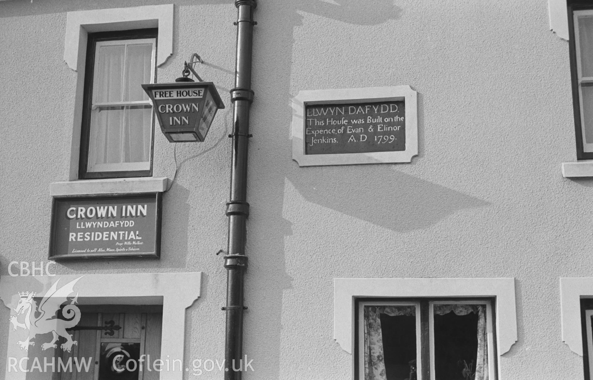 Black and White photograph showing inscription on slate plaque on front of the Crown Inn, Llwyndafydd. Photographed by Arthur Chater in April 1963 from Grid Reference SN 371 555, looking north.