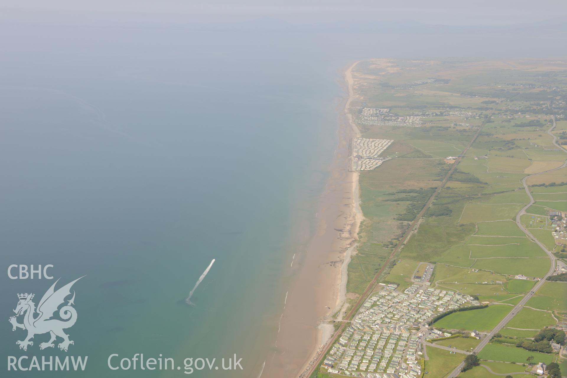 Peat deposits at Llanaber, north west of Barmouth. Oblique aerial photograph taken during the Royal Commission?s programme of archaeological aerial reconnaissance by Toby Driver on 12th July 2013.