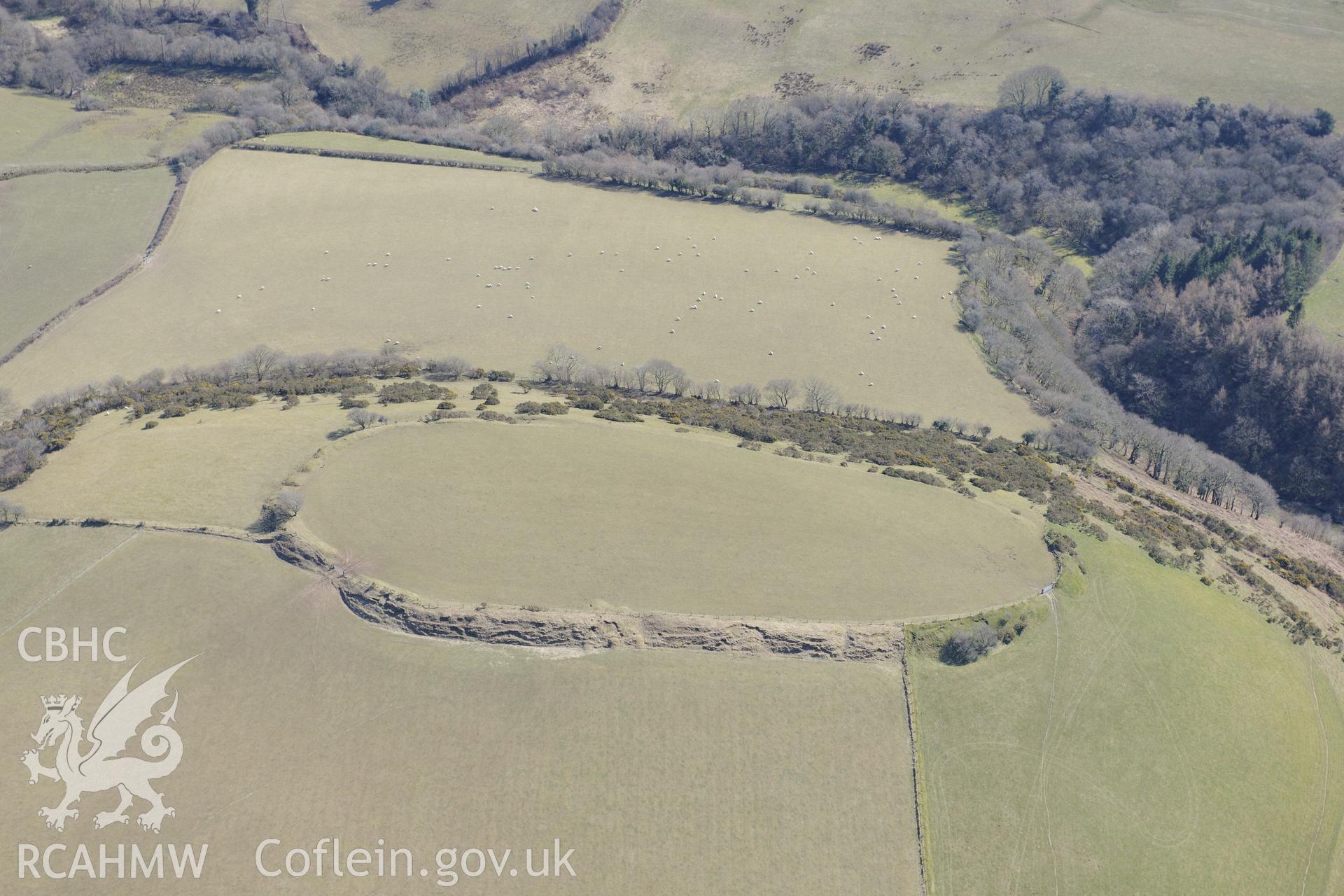 Castell Moeddyn defended enclosure or hillfort north of Gorsgoch, near Lampeter. Oblique aerial photograph taken during the Royal Commission's programme of archaeological aerial reconnaissance by Toby Driver on 2nd April 2013.