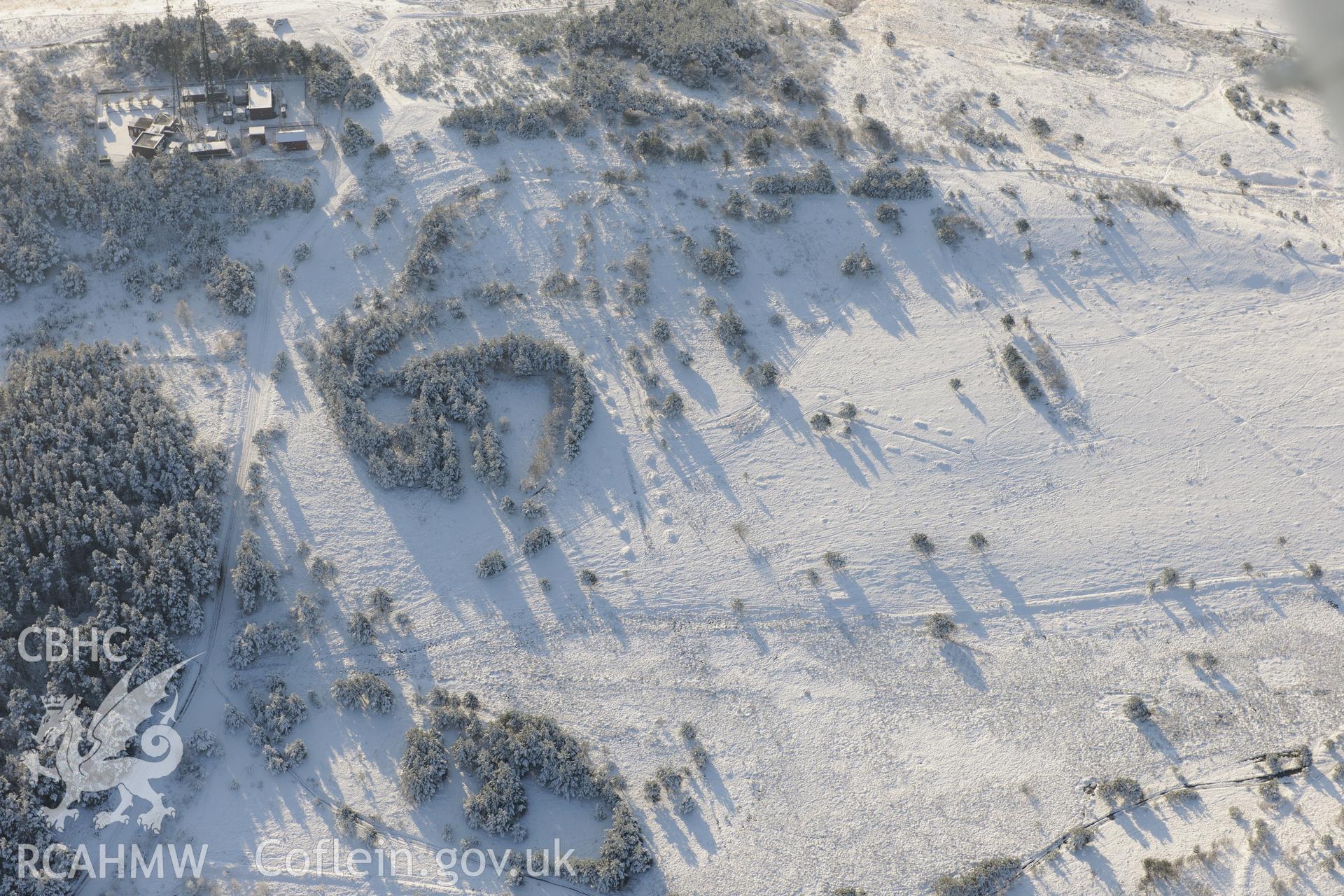 Kilvey Hill anti-glider trenches, eastern Swansea. Oblique aerial photograph taken during the Royal Commission?s programme of archaeological aerial reconnaissance by Toby Driver on 24th January 2013.