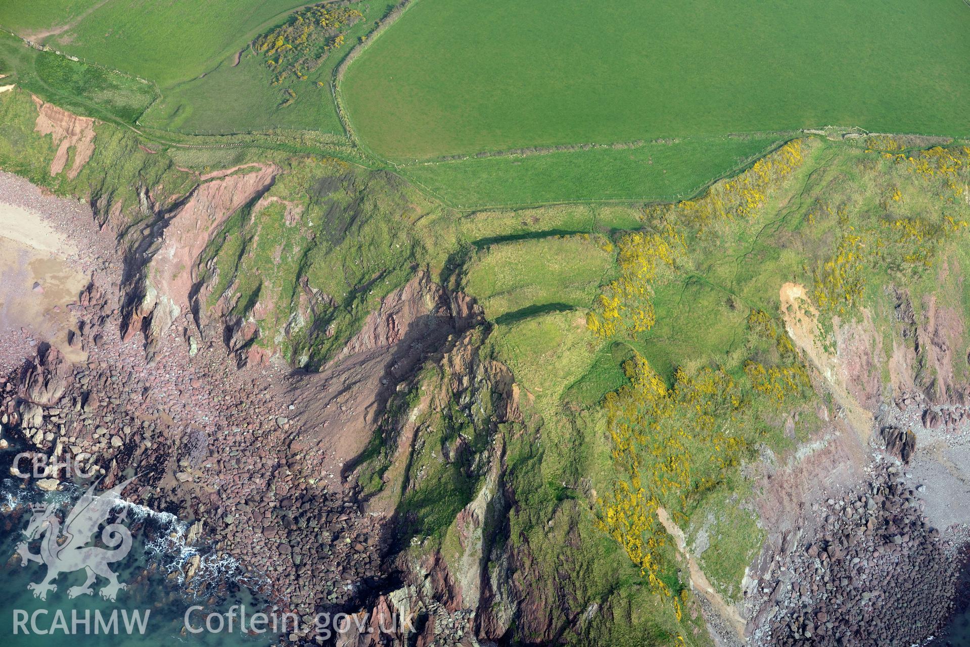 Aerial photography of Great Castle Head taken on 27th March 2017. Baseline aerial reconnaissance survey for the CHERISH Project. ? Crown: CHERISH PROJECT 2017. Produced with EU funds through the Ireland Wales Co-operation Programme 2014-2020. All material made freely available through the Open Government Licence.