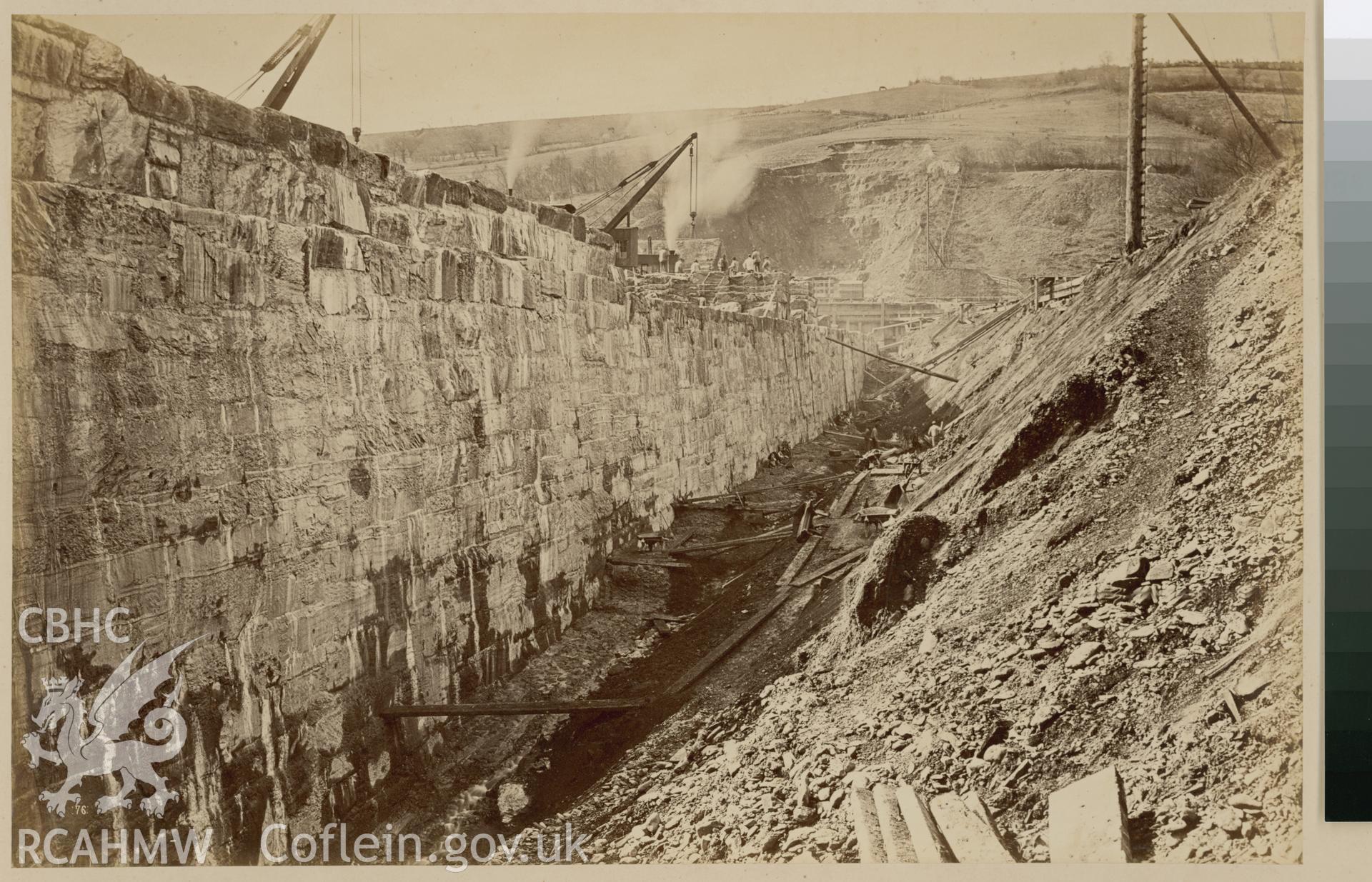 Digital copy of an albumen print from Edward Hubbard Collection. Album 'Lake Vyrnwy Photographs' print entitled 'The Vyrnwy Masonry Dam' showing the water face of the wall, taken March 1885.