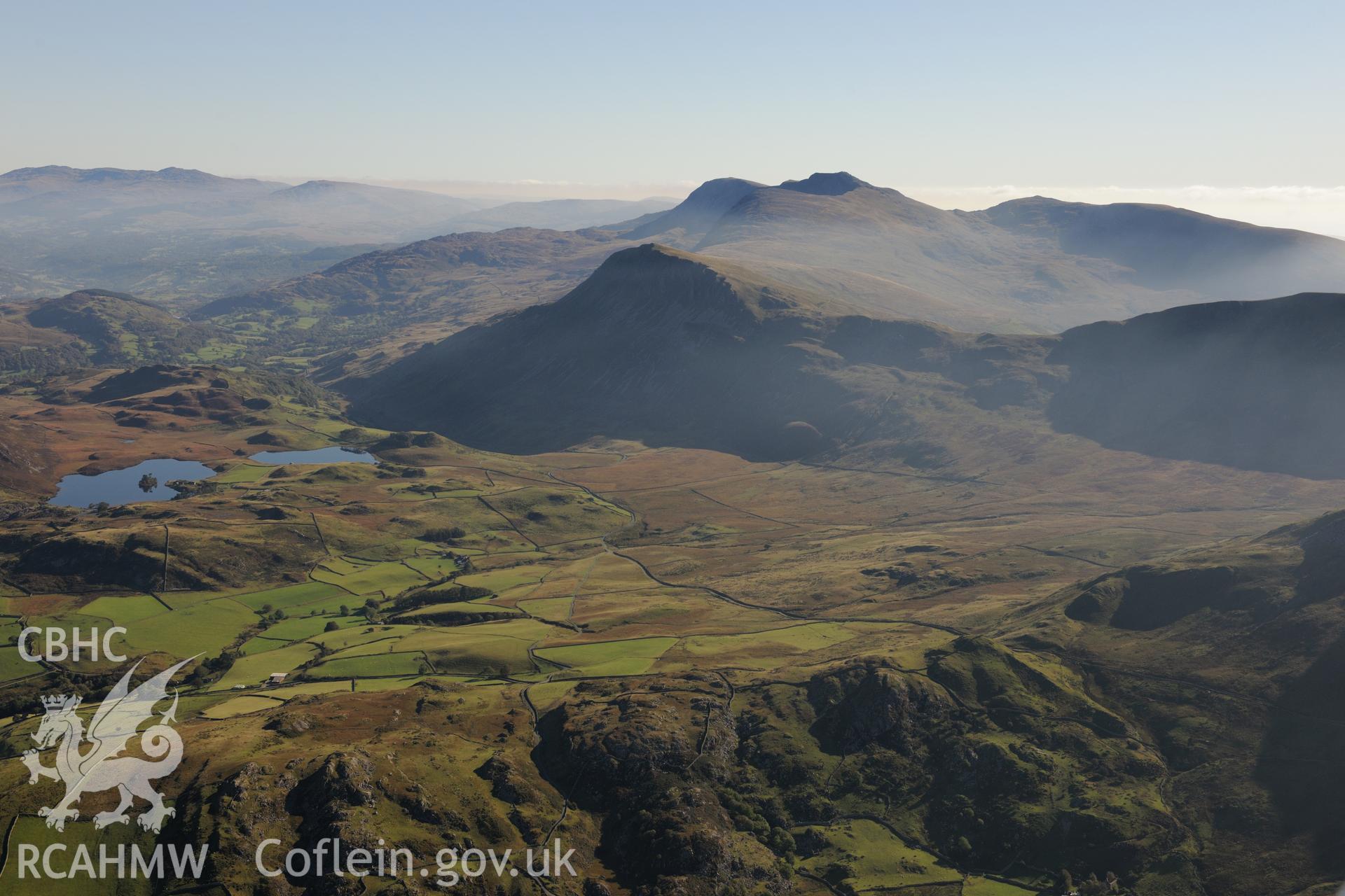 Cadair Idris and Llynnau Cregennen. Oblique aerial photograph taken during the Royal Commission's programme of archaeological aerial reconnaissance by Toby Driver on 2nd October 2015.