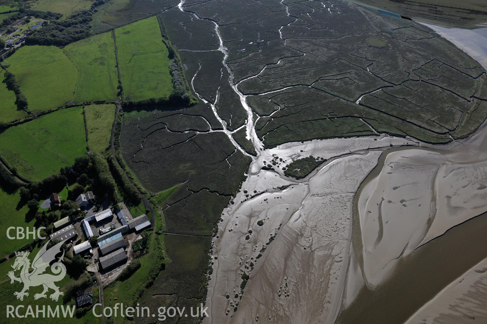 St. Michael's chapel, Cwrt-y-Carnau farmhouse and Cwrt-y-Carnau farmbuildings, Llwchwr, east of Llanelli. Oblique aerial photograph taken during the Royal Commission's programme of archaeological aerial reconnaissance by Toby Driver on 30th September 2015.