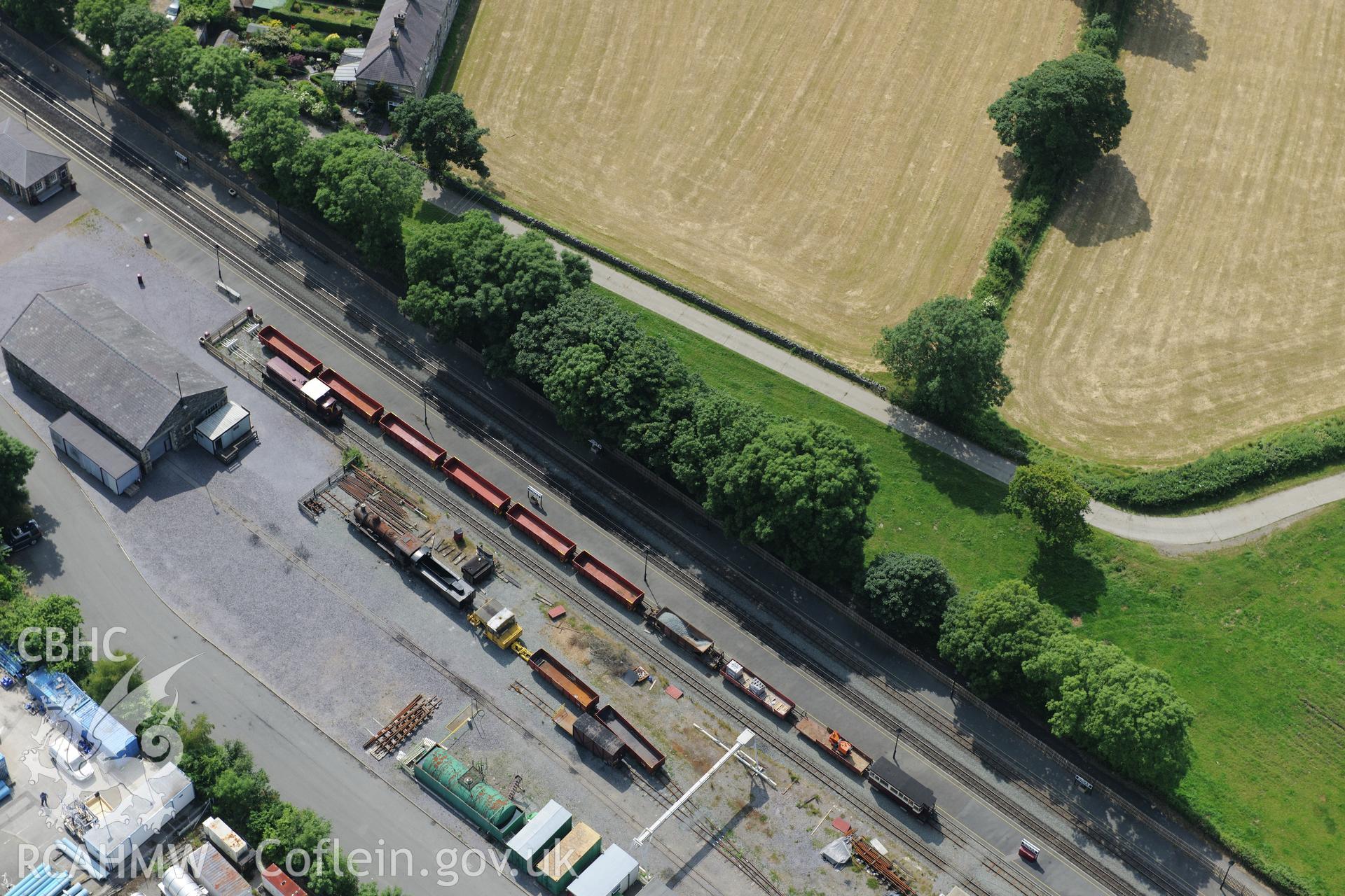 Dinas Junction railway station, Welsh Highland Railway. Oblique aerial photograph taken during the Royal Commission?s programme of archaeological aerial reconnaissance by Toby Driver on 12th July 2013.