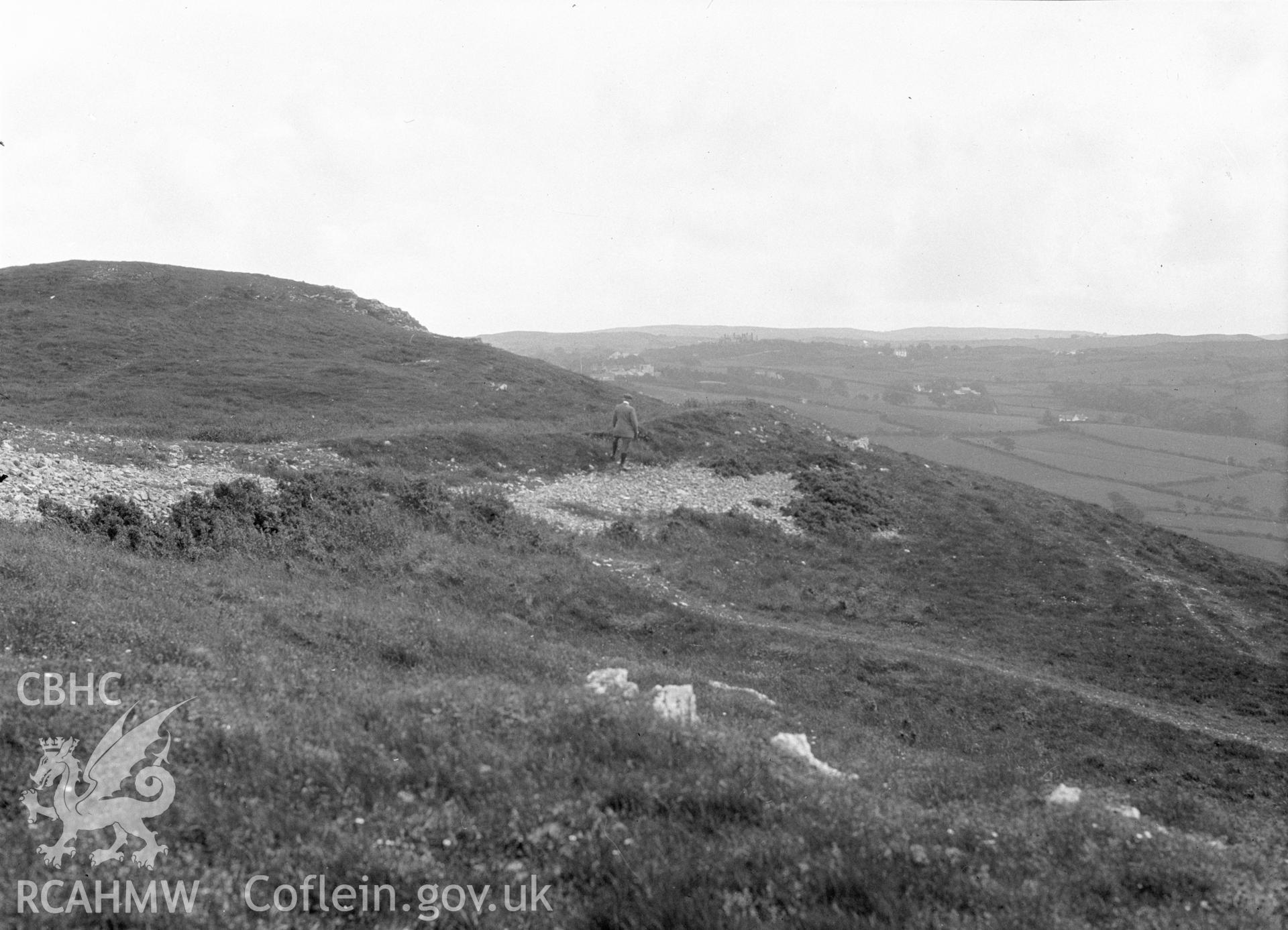 Digital copy of a black and white negative relating to Bryn Euryn Camp. From the Cadw Monuments in Care Collection.