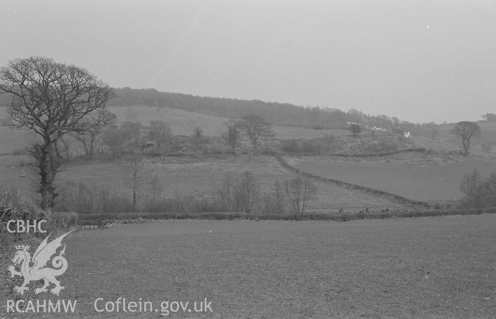 Digital copy of a black and white negative showing view of Castell Olwen hillfort, Lampeter. Photographed in March 1964 by Arthur O. Chater from Grid Reference SN 5774 4936, looking east south east.