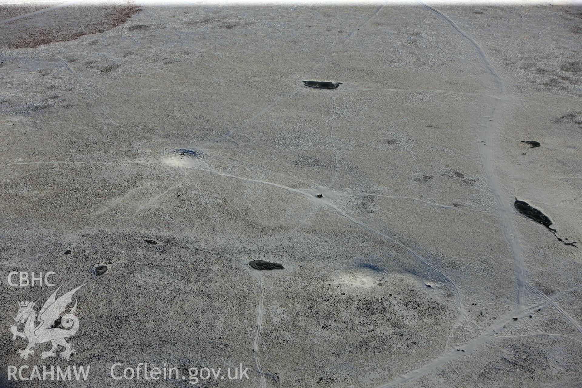 Barrow V and VI on Aberedw Hill, east of Builth Wells. Oblique aerial photograph taken during the Royal Commission?s programme of archaeological aerial reconnaissance by Toby Driver on 15th January 2013.