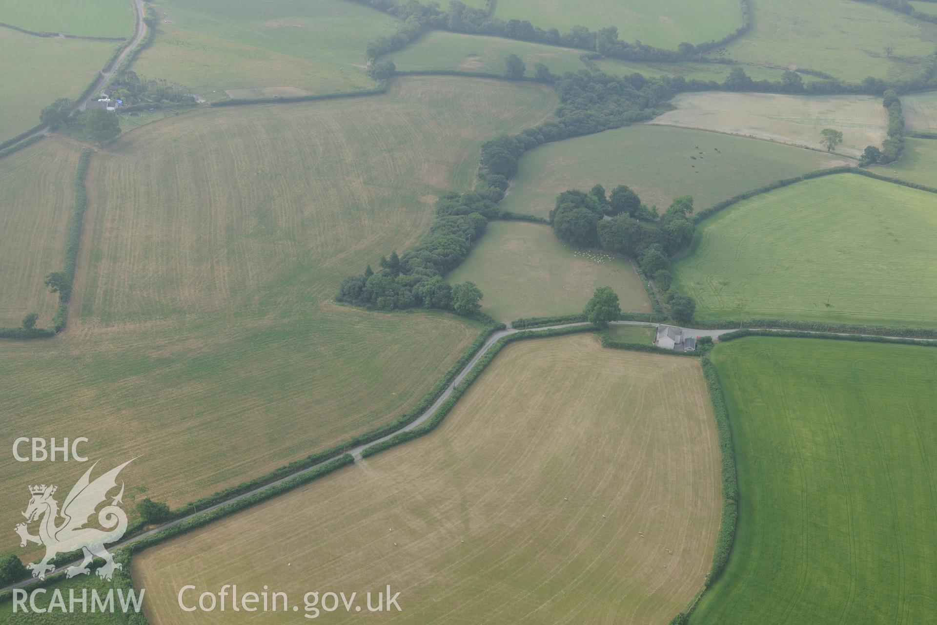 Royal Commission aerial photography of Llangan Church recorded during drought conditions on 22nd July 2013.