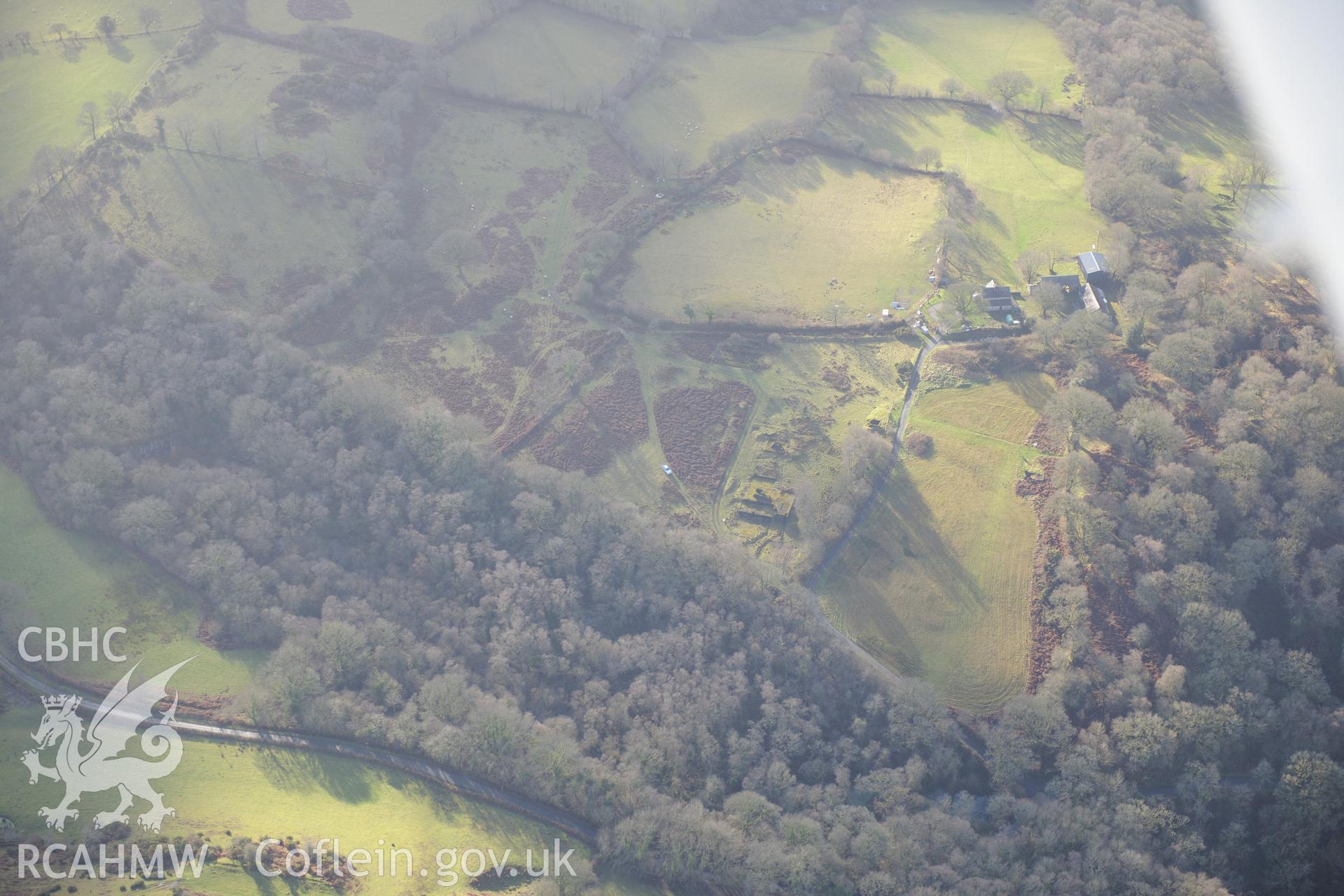 'Giants Graves' or pillow mounds and possible mill site at Pen-Lan-Wen. Oblique aerial photograph taken during the Royal Commission's programme of archaeological aerial reconnaissance by Toby Driver on 6th January 2015.