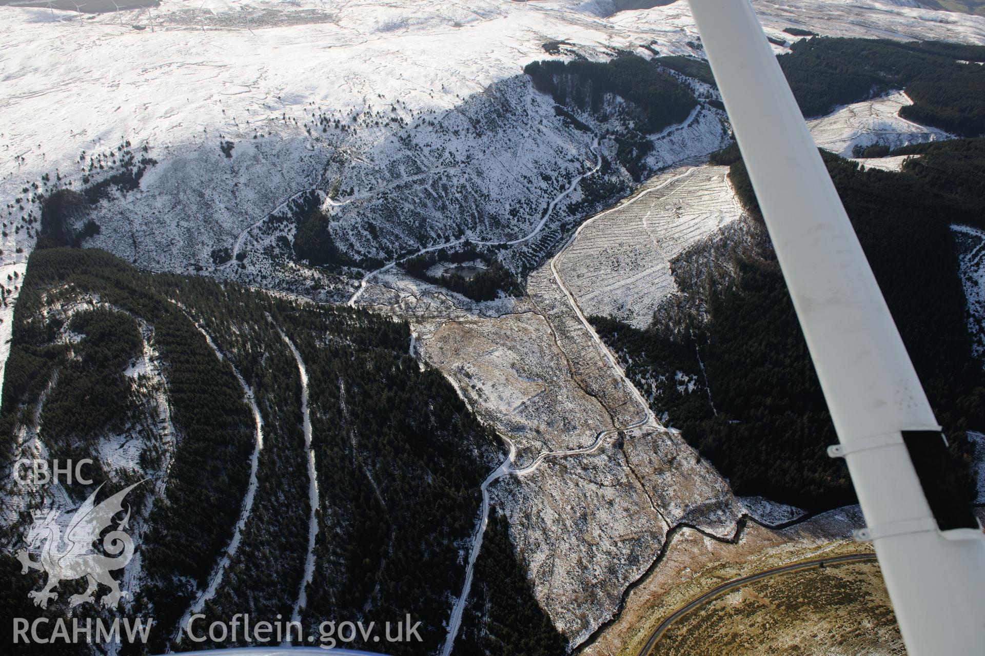 Cae Gaer roman fort, also known as Gorsedd Arthur, west of Llangurig. Oblique aerial photograph taken during the Royal Commission's programme of archaeological aerial reconnaissance by Toby Driver on 4th February 2015.