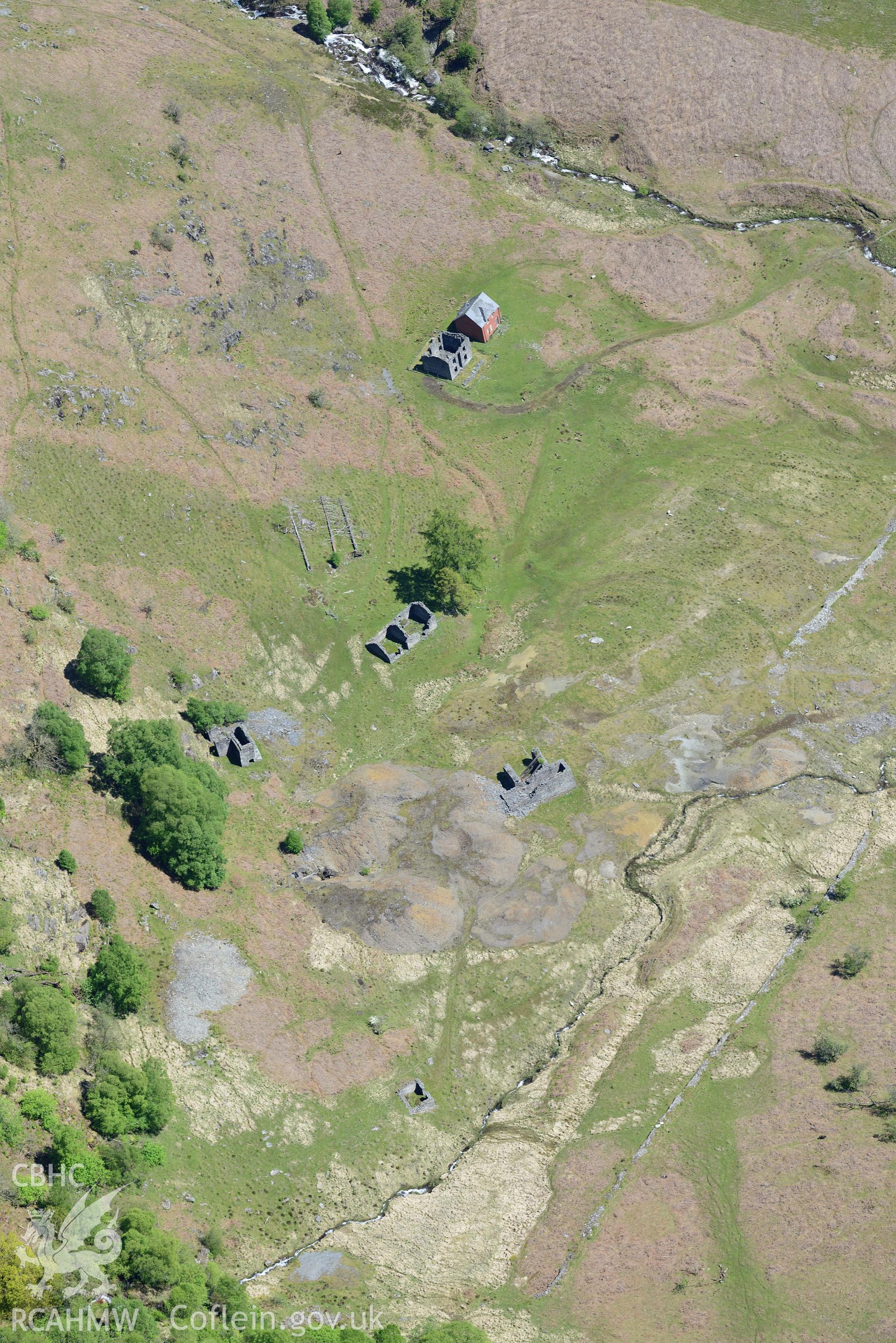 Cwm Elan lead mine complex, including the remains of a house, office, quarry, mine shaft and wheel pit. Oblique aerial photograph taken during the Royal Commission's programme of archaeological aerial reconnaissance by Toby Driver on 3rd June 2015.