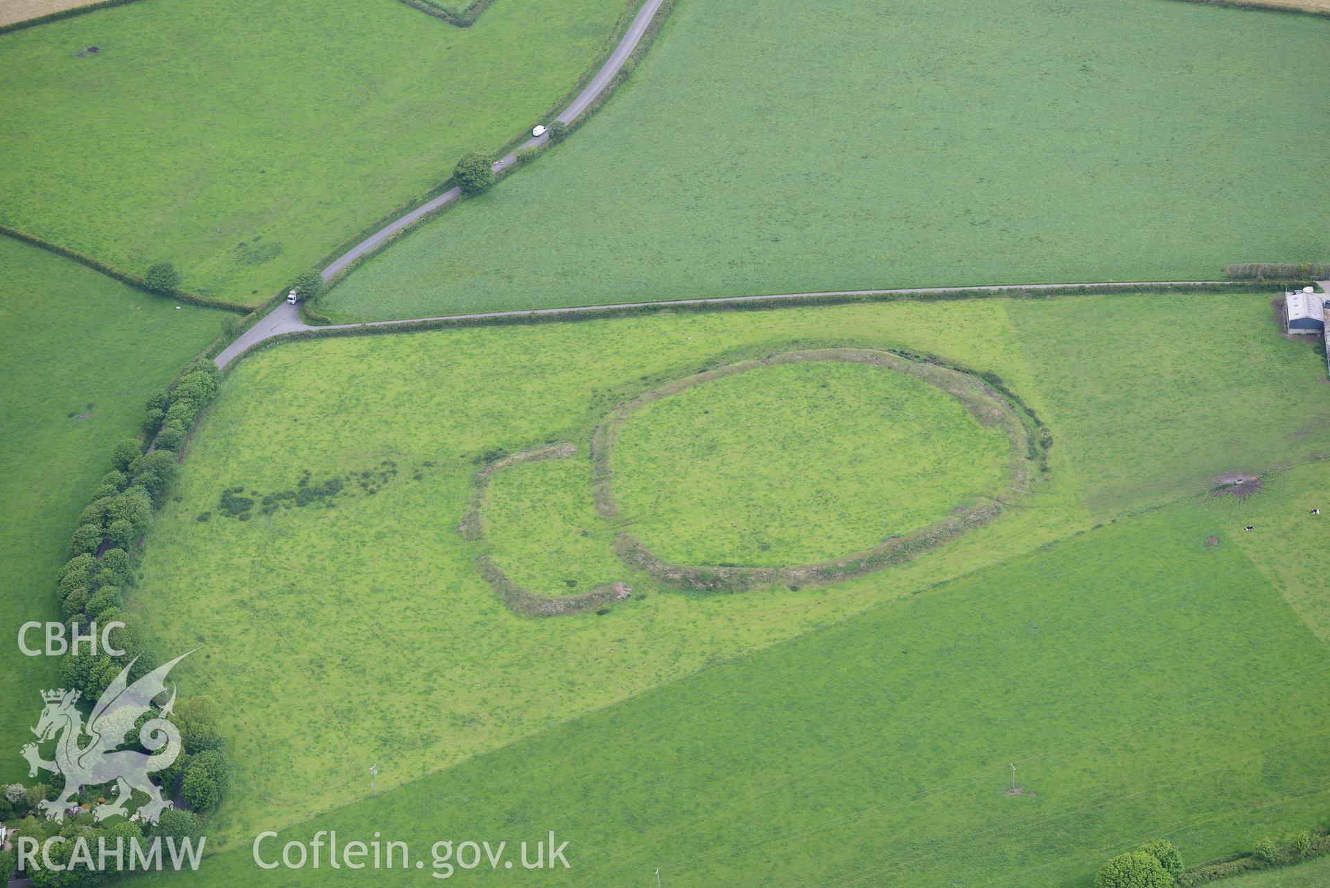 Scollock Rath defended enclosure. Oblique aerial photograph taken during the Royal Commission's programme of archaeological aerial reconnaissance by Toby Driver on 3rd June 2015.