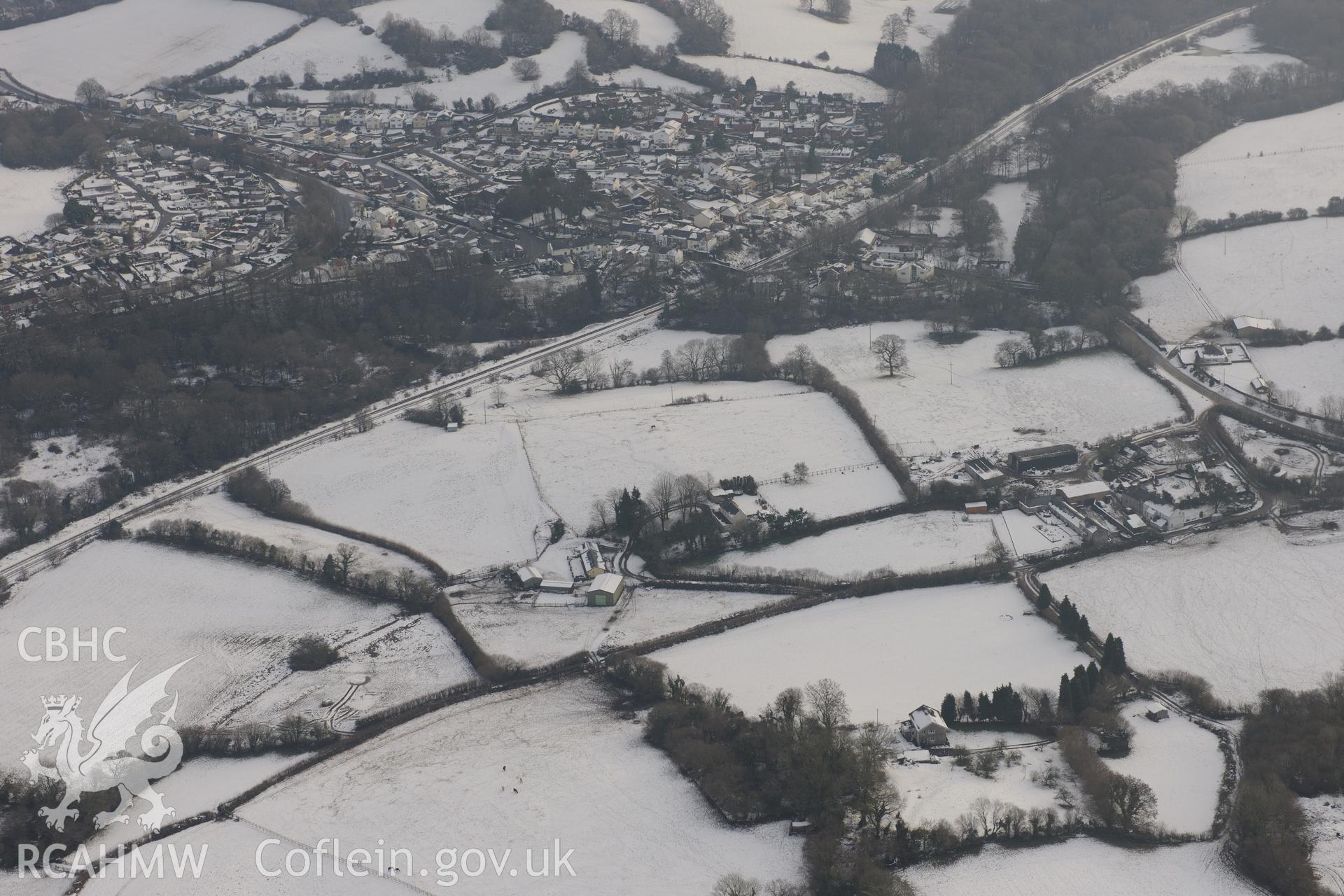 Miskin Roman Fort, Miskin, Pontyclun. Oblique aerial photograph taken during the Royal Commission?s programme of archaeological aerial reconnaissance by Toby Driver on 24th January 2013.