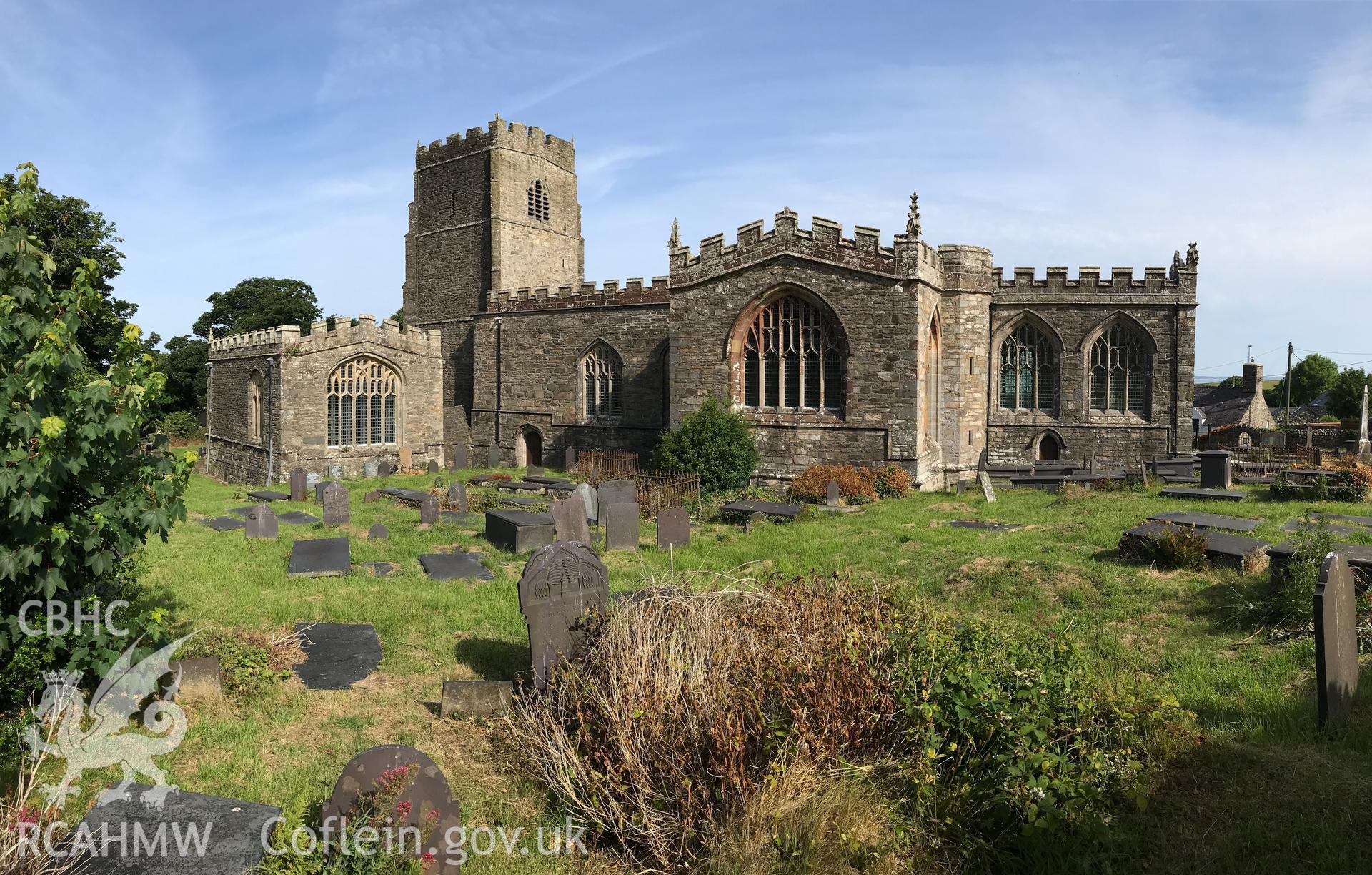 Colour photo showing external view of St. Bueno's Church and associated graveyard, Clynnog Fawr, taken by Paul R. Davis, 23rd June 2018.