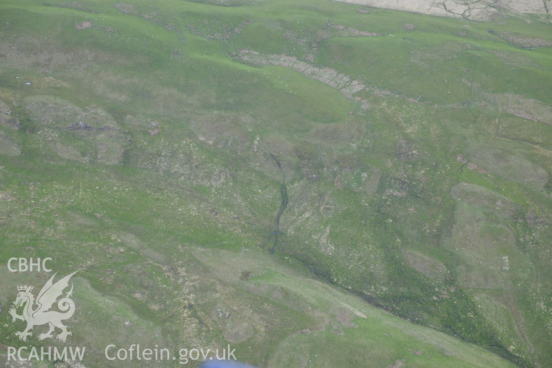 Cyrnau Long Hut. Oblique aerial photograph taken during the Royal Commission's programme of archaeological aerial reconnaissance by Toby Driver on 3rd June 2015.