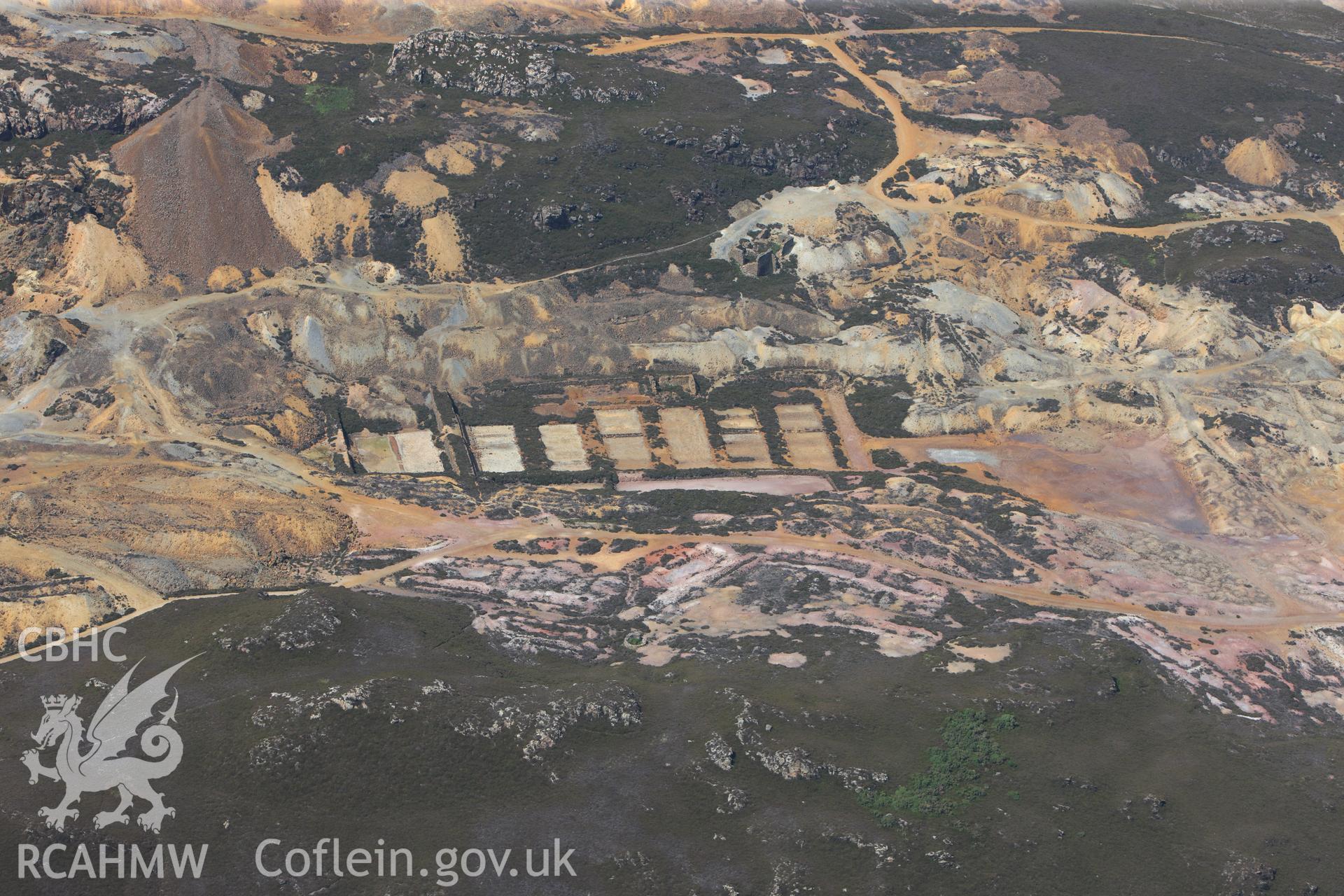 Parys Mountain copper mines, Amlwch, Anglesey. Oblique aerial photograph taken during the Royal Commission?s programme of archaeological aerial reconnaissance by Toby Driver on 12th July 2013.