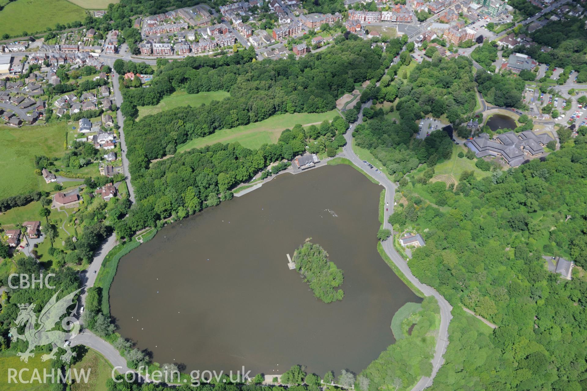 Powys County Hall and the Lake Cottage, Llandrindod Wells. Oblique aerial photograph taken during the Royal Commission's programme of archaeological aerial reconnaissance by Toby Driver on 30th June 2015.