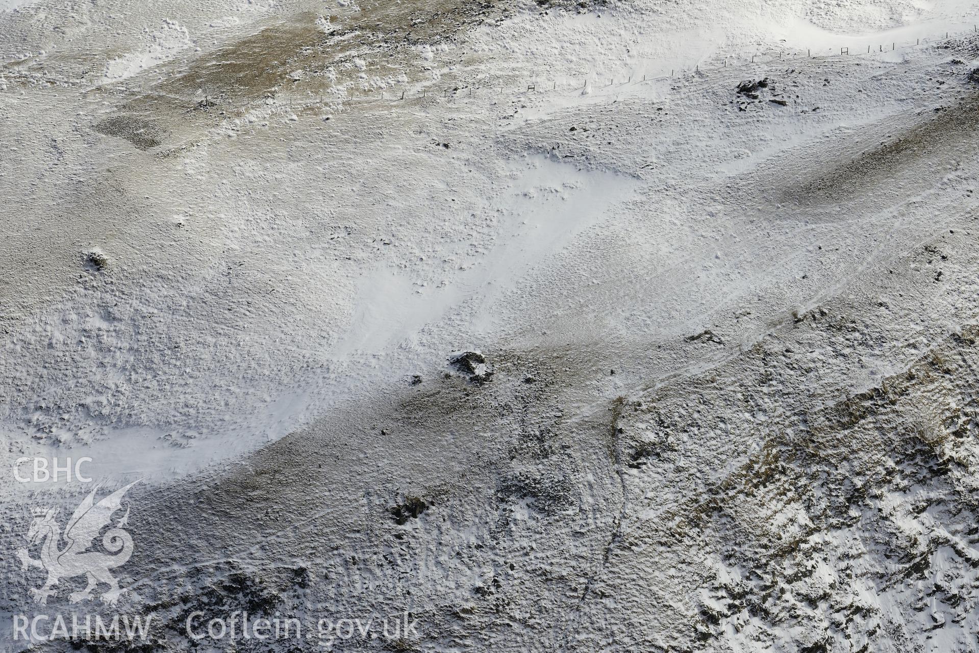 North cairn at Pen Plynlimon Fawr, between Aberystwyth and Llangurig. Oblique aerial photograph taken during the Royal Commission's programme of archaeological aerial reconnaissance by Toby Driver on 4th February 2015.