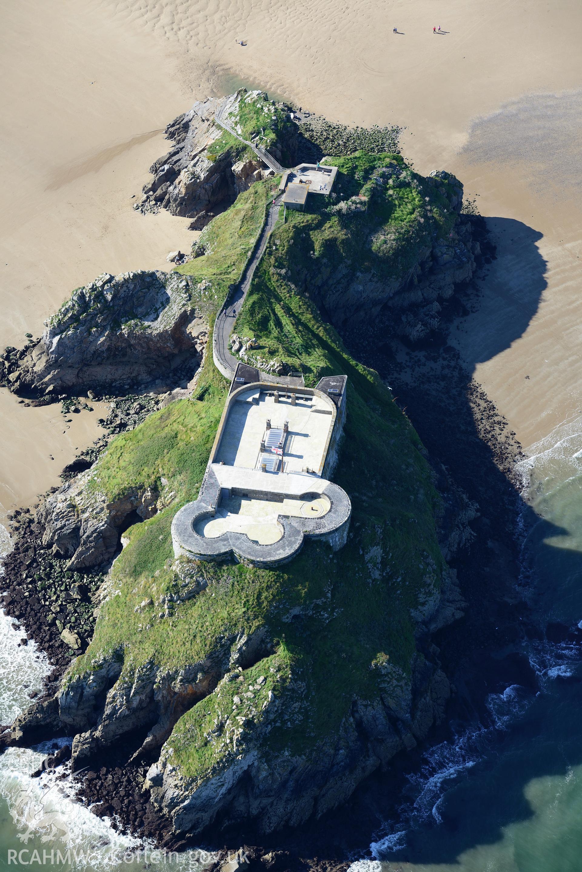 St. Catherine's Island, Tenby, including view of the fort and gun emplacement, and site of the former St. Cathereine's chapel. Oblique aerial photograph taken during Royal Commission's programme of archaeological aerial reconnaissance by Toby Driver on 30th September 2015.