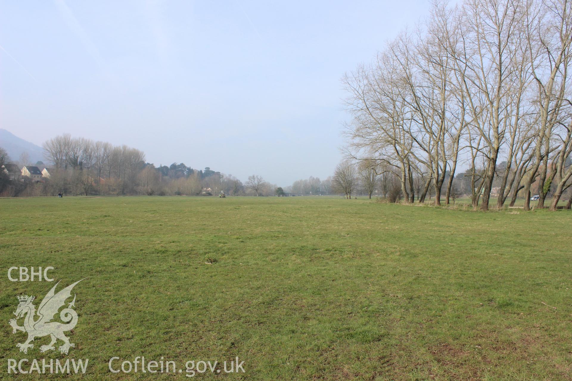 'View from the centre of proposed Site A towards the west.' Photographed on site visit for archaeological desk based assessment of the proposed Eisteddfod Site at Castle Meadows and Llanfoist, Abergavenny, carried out by Archaeology Wales, 2014.