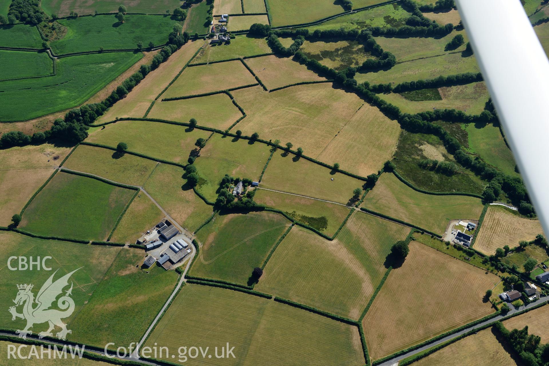 Royal Commission aerial photography of Glynrhiced-fach possible enclosure, taken on 19th July 2018 during the 2018 drought.