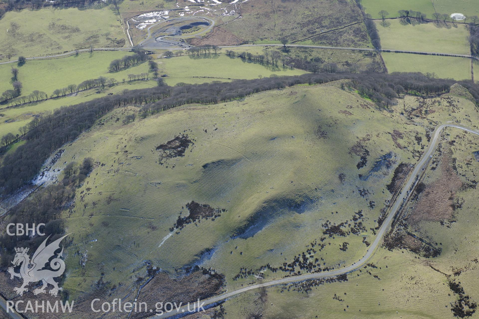 Florida lead and zinc mine, and pillow mounds neare Pen-y-Bannau Hillfort, Strata Florida, Pontrhydfendigaid. Oblique aerial photograph taken during the Royal Commission's programme of archaeological aerial reconnaissance by Toby Driver on 4th February 2015.